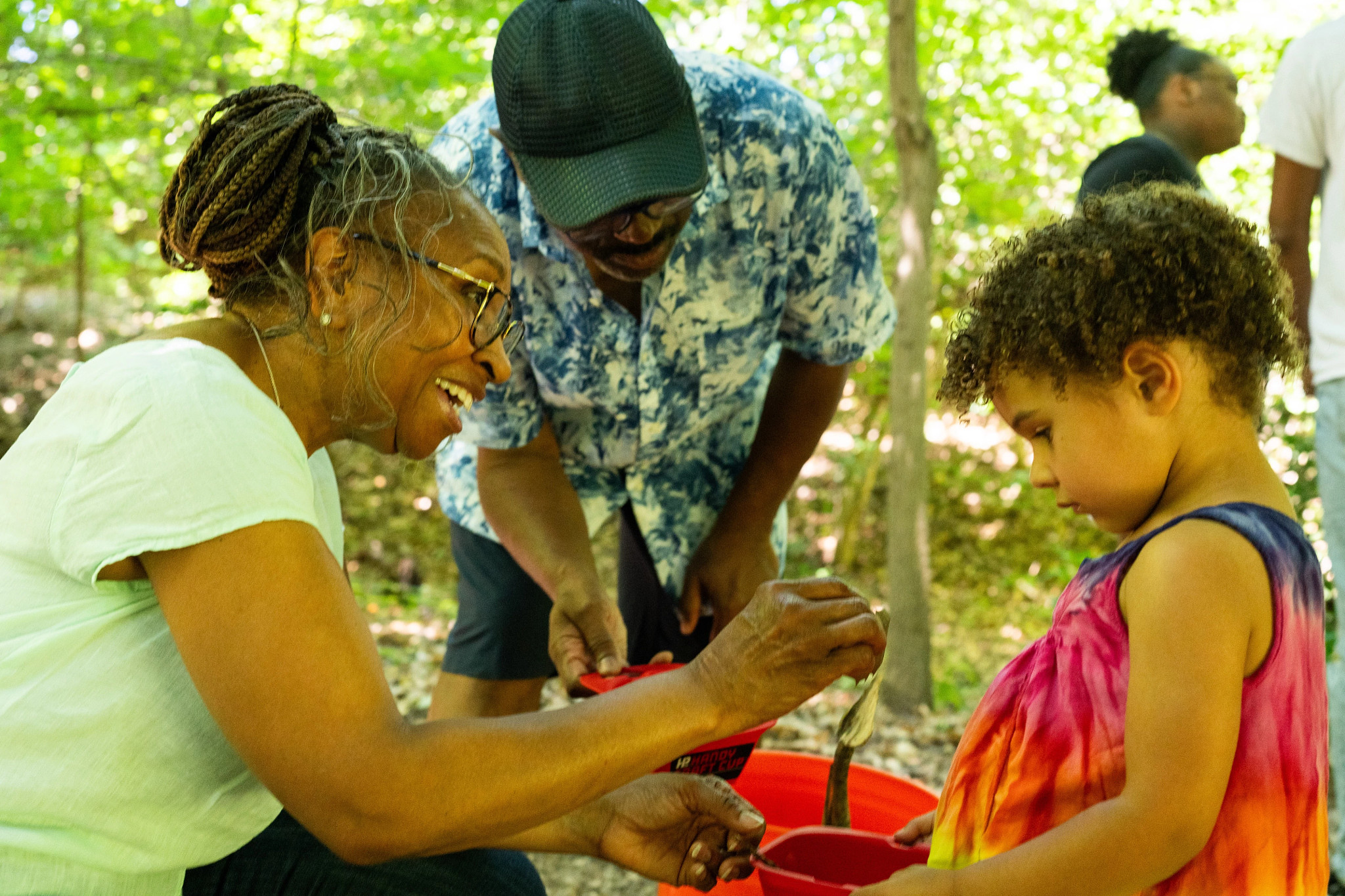 Adele Nies, her grandmother Melinda and granduncle Ed decide what goes in her fairy garden