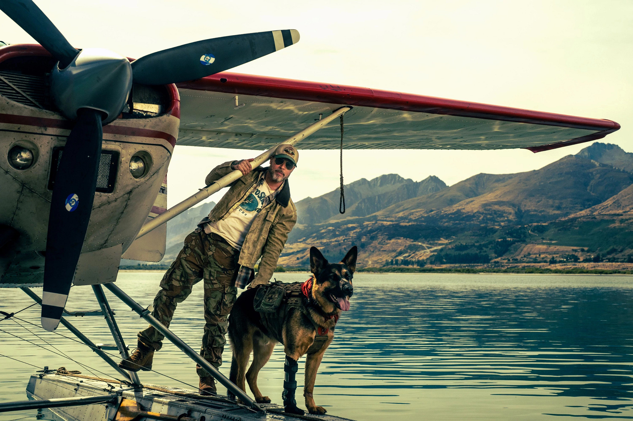 Brad Pitt and dog in a scene from Heart of the Beast