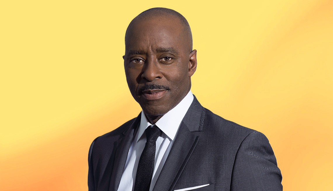 Courtney B. Vance interview Courtney B. Vance against yellow ombre background