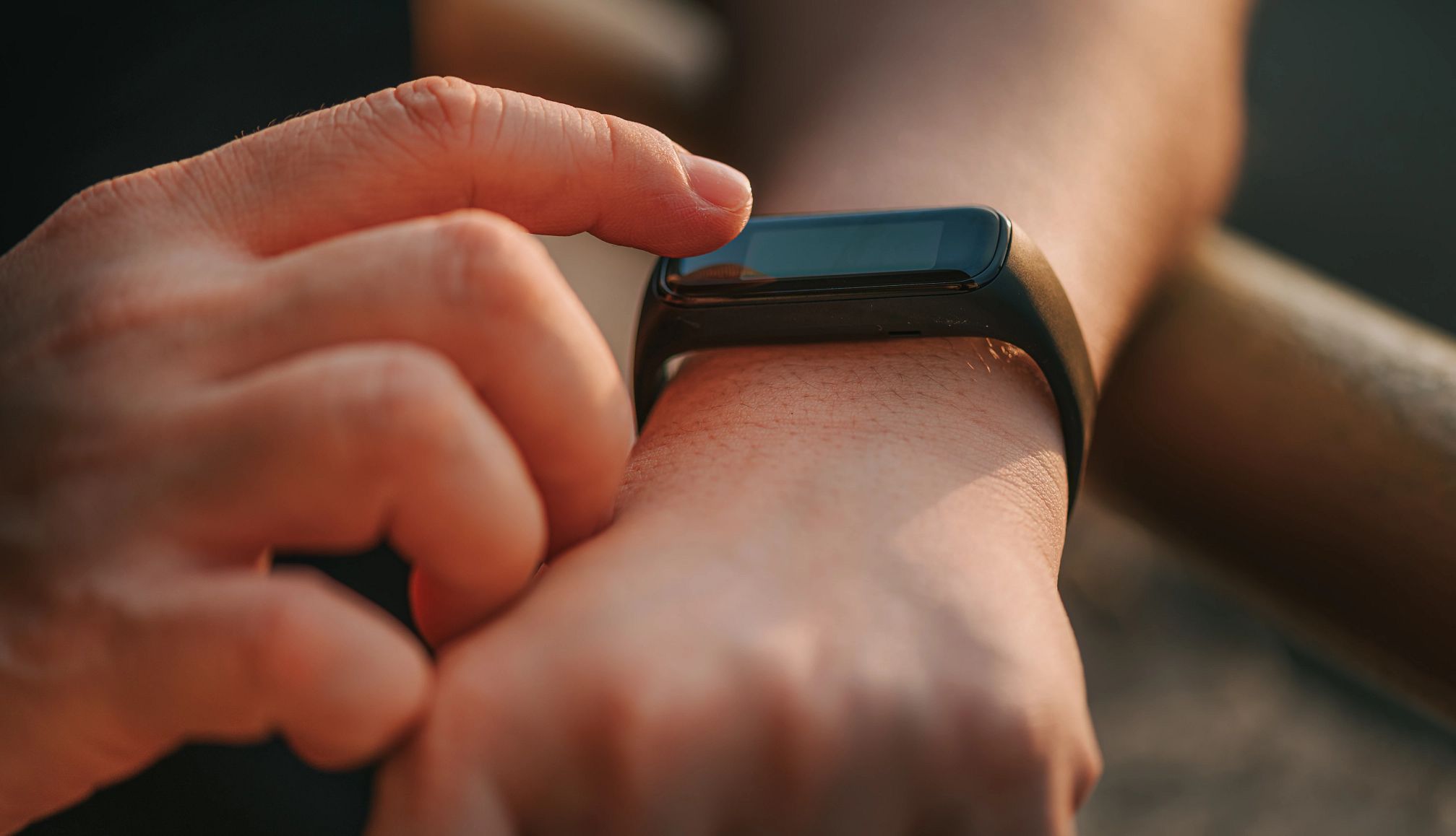 Don’t Use Your Smartwatch or Smart Ring to Measure Blood Glucose Levels, FDA Says a person checking their smartwatch