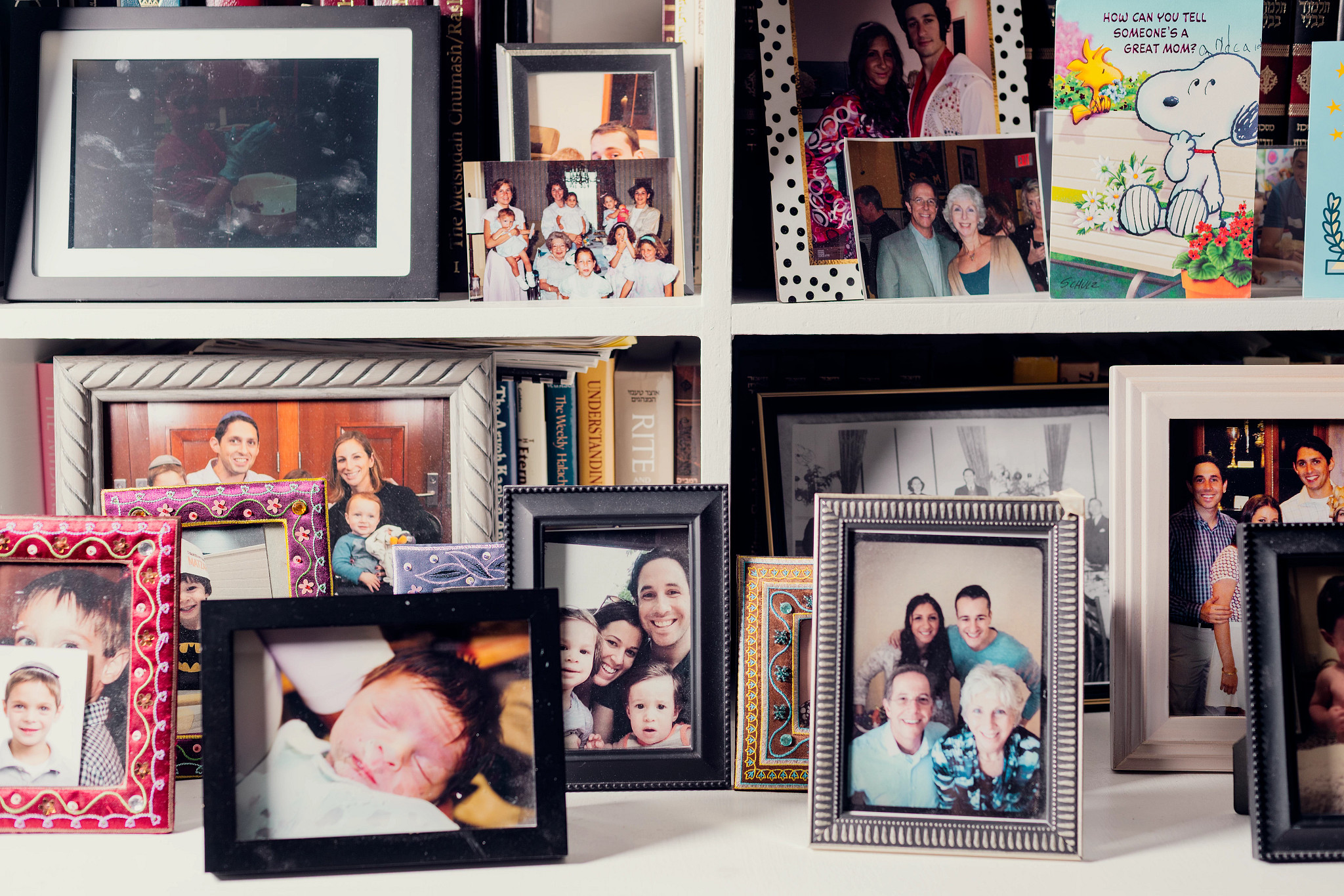 people looking at family photos