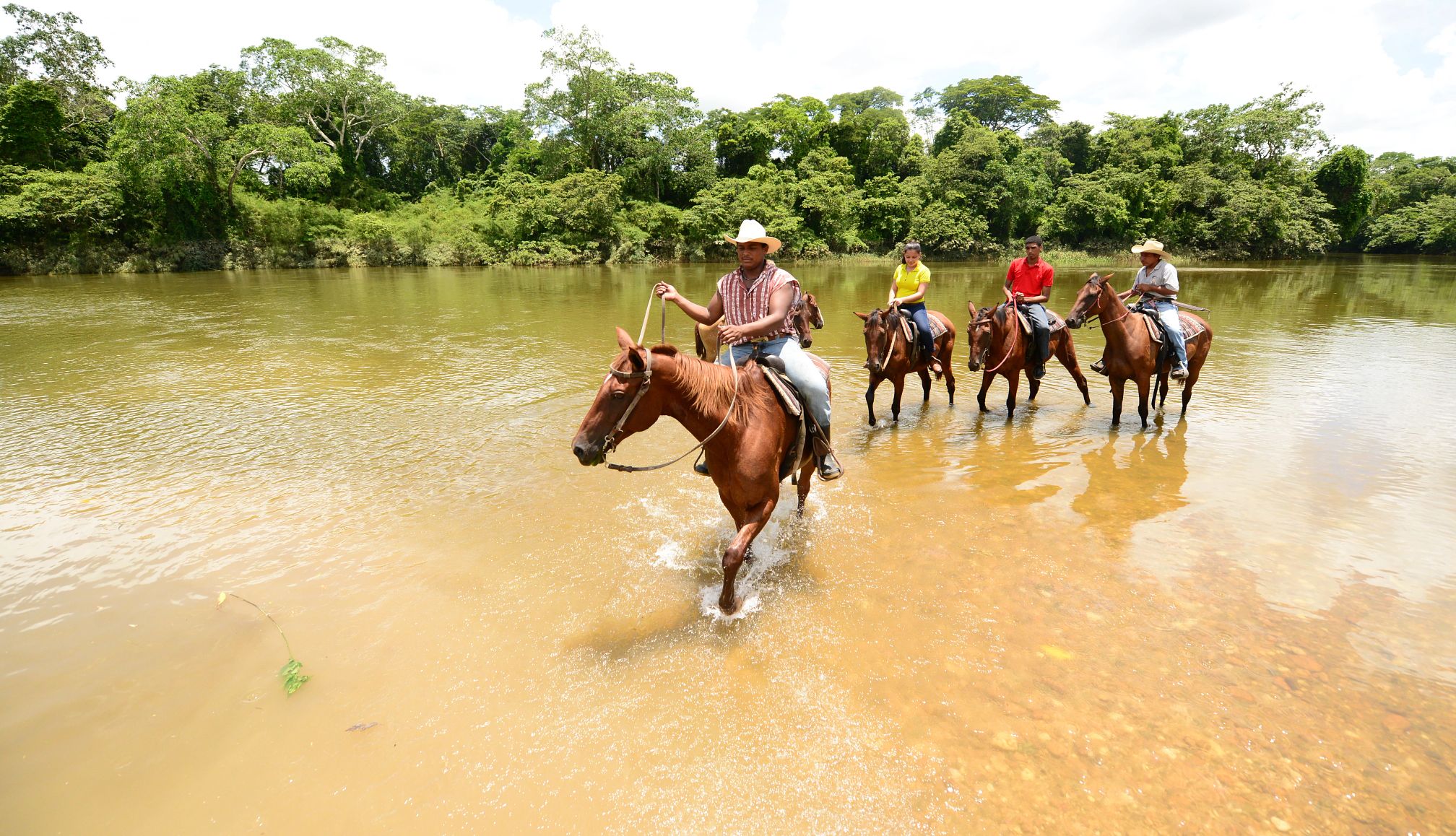 Belize has beautiful beaches as well as cultural experiences travelers on horseback in Belize