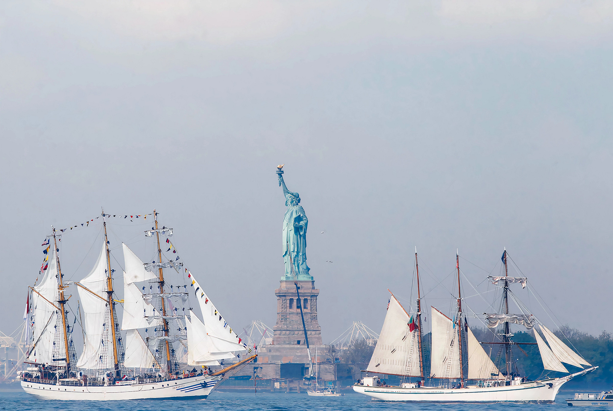 Ships near the Statue of Liberty in New York