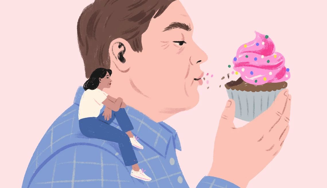 My Husband's Health Worries Me a man eats a cupcake with a small woman sitting on his shoulder