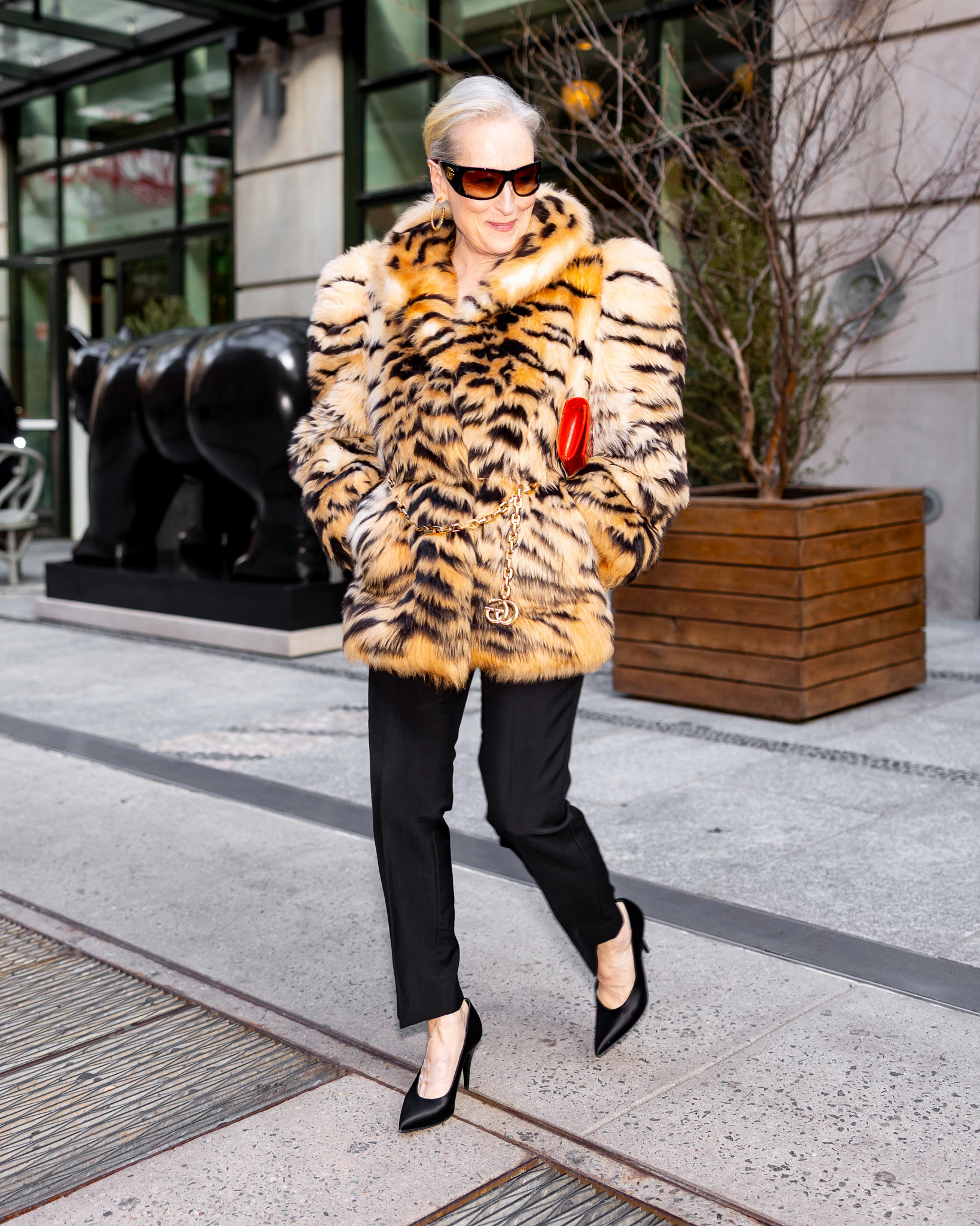 Streep arrives at Lincoln Center wearing a Gucci tiger-print fur coat