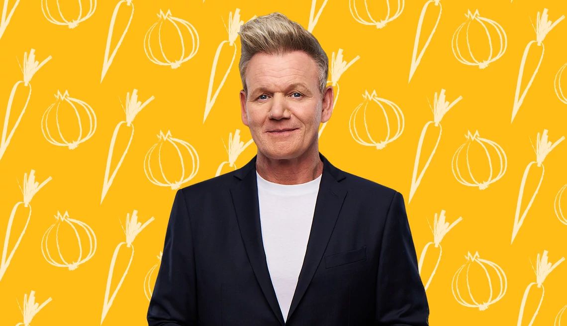 Gordon Ramsay Turns Comedy Clip Into Cookbook a photograph shows chef Gordon Ramsay in front of a food-themed yellow backdrop
