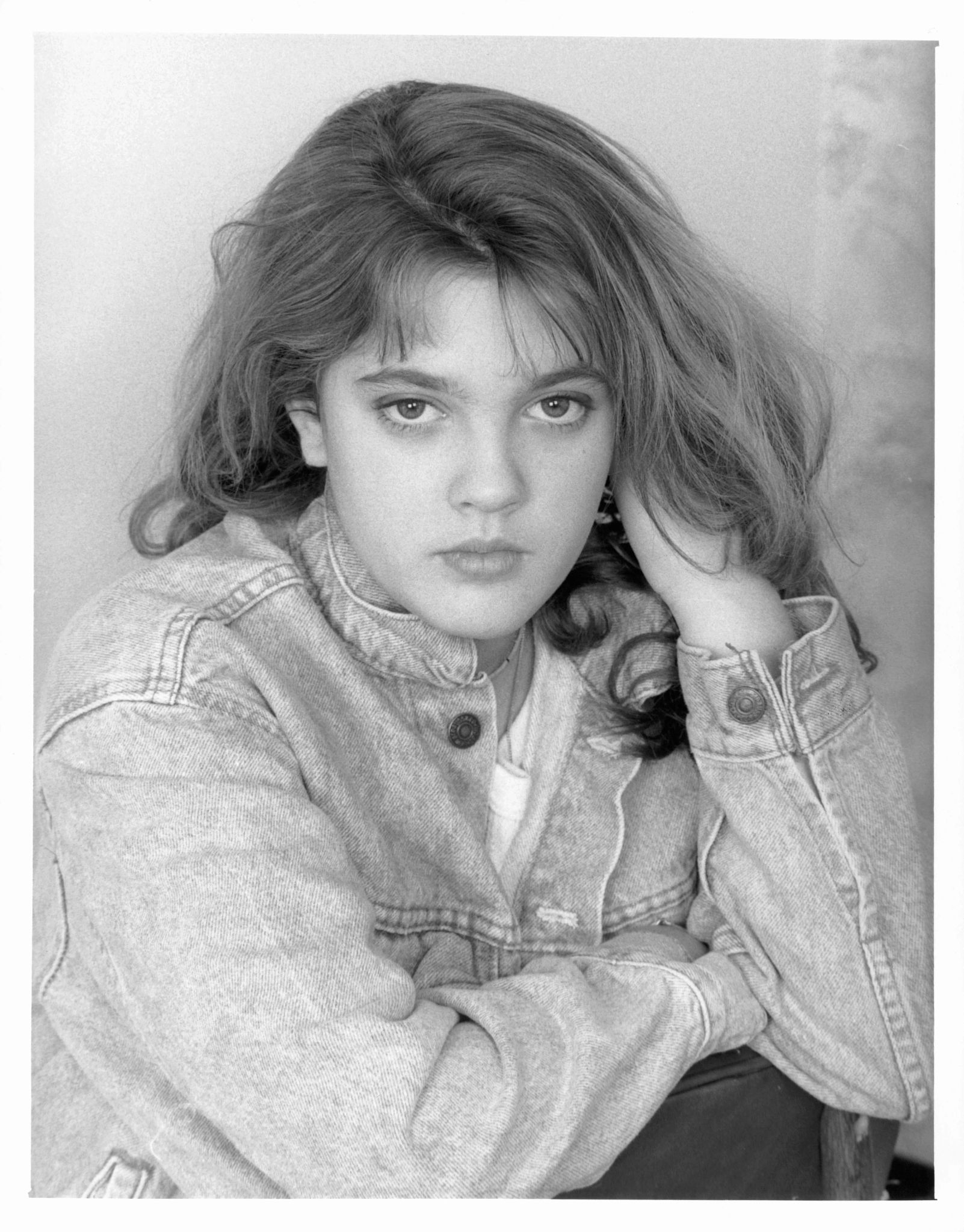 young drew barrymore black and white headshot of a young drew barrymore