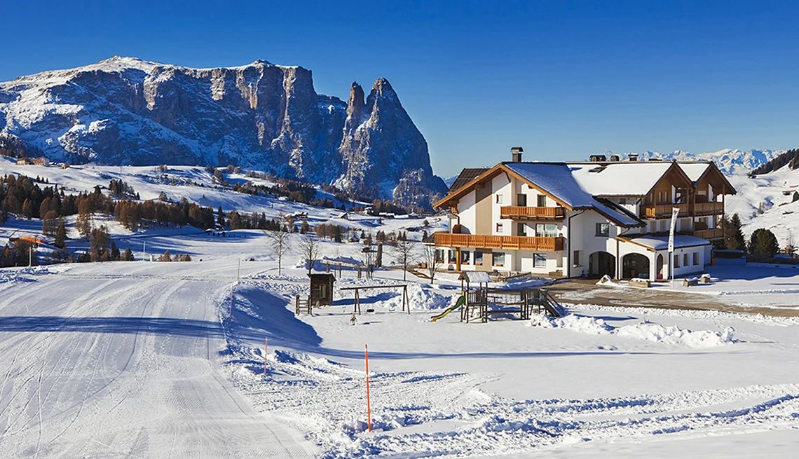 Ski challet at a rocky mountain restor covered in snow