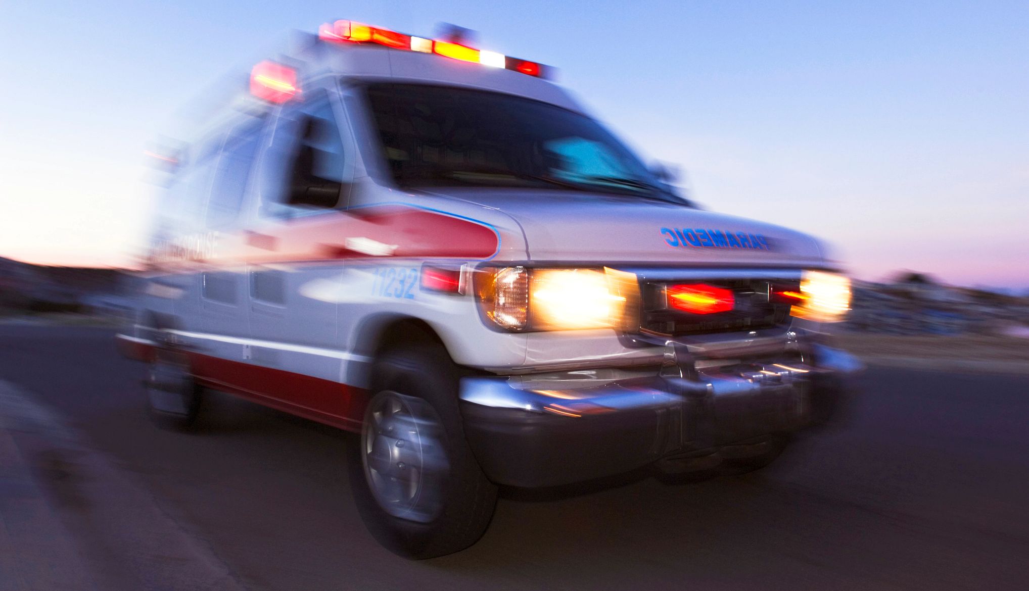 Treatments for Stroke Blurred view of ambulance driving at dusk