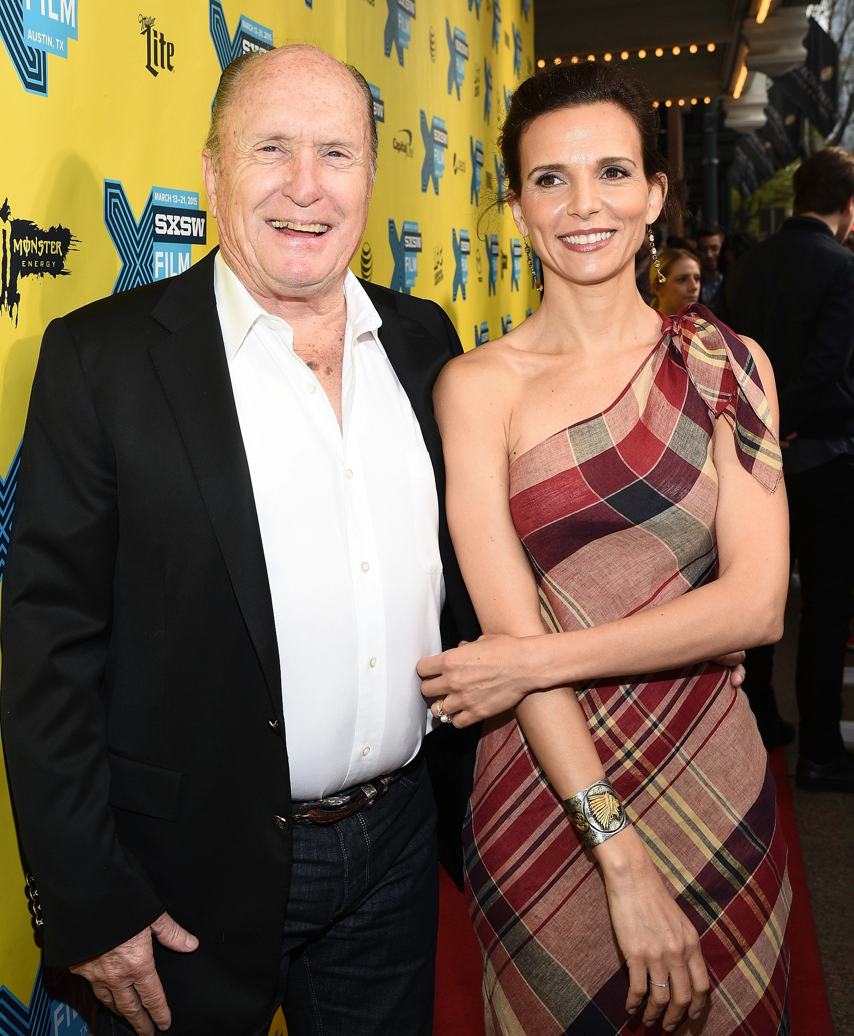 robert duvall and his wife luciana standing up on a red carpet