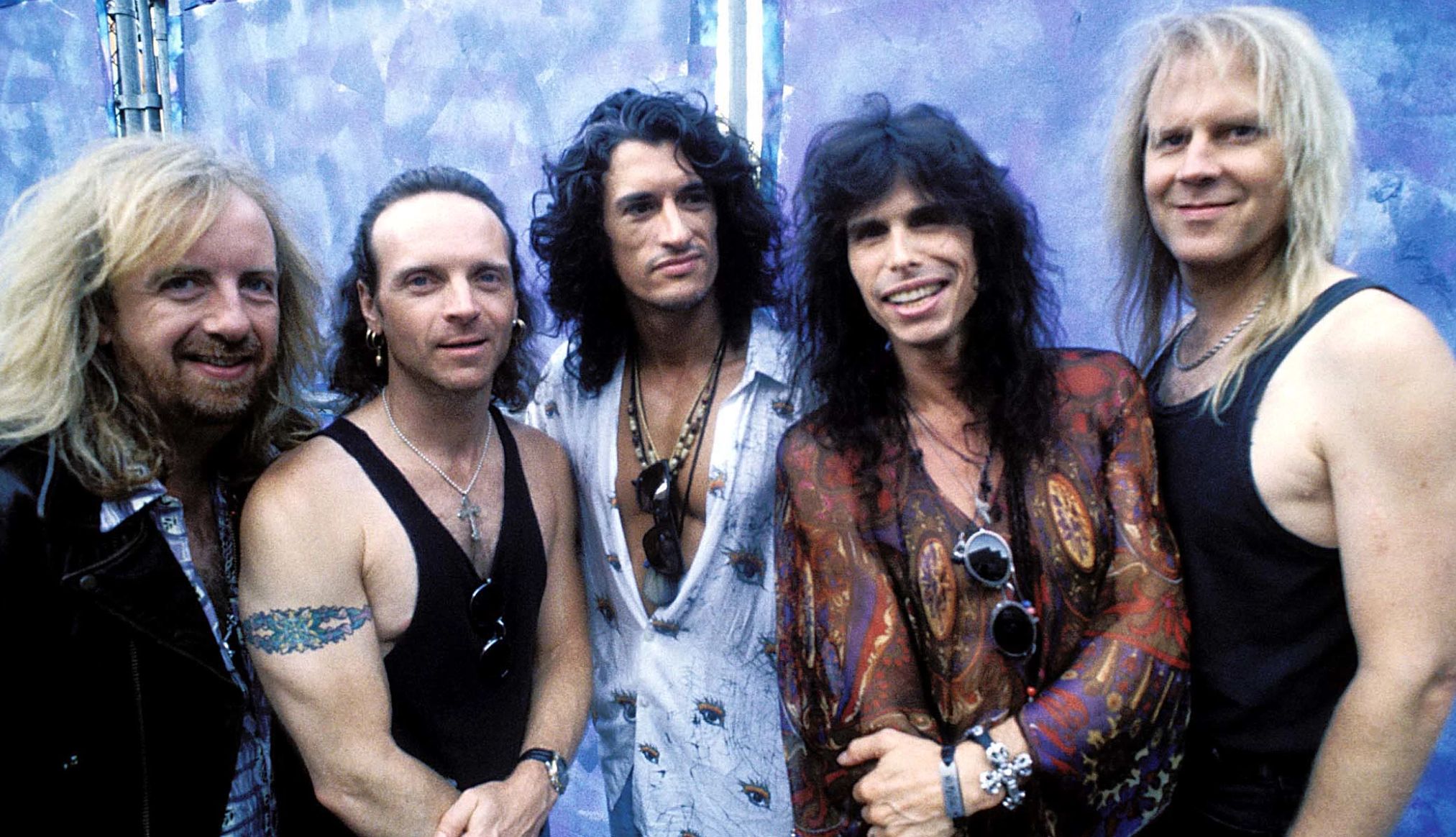 Aerosmith Brad Whitford, Joey Kramer, Joe Perry, Steven Tyler and Tom Hamilton of the band Aerosmith standing together for a group portrait