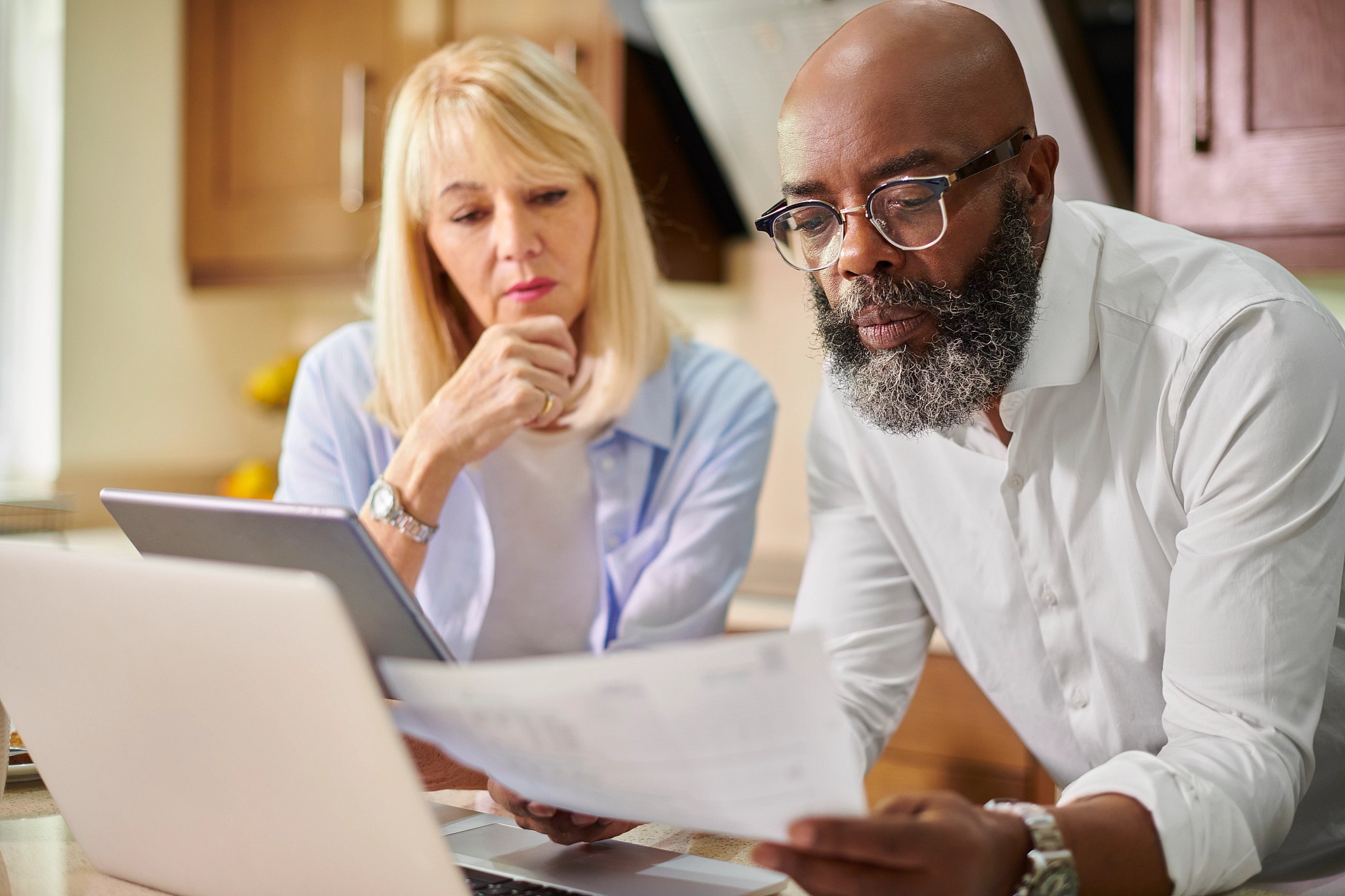 Woman and Man looking at financial documents