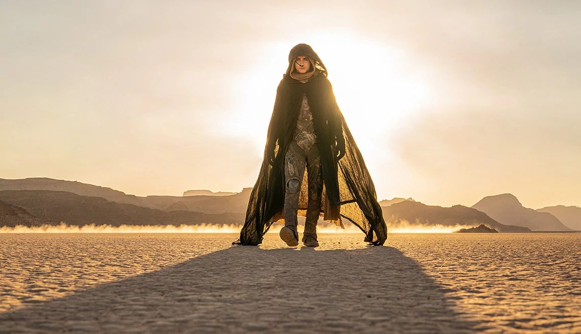 Timothée Chalamet walking in a desert in "Dune: Part Two."
