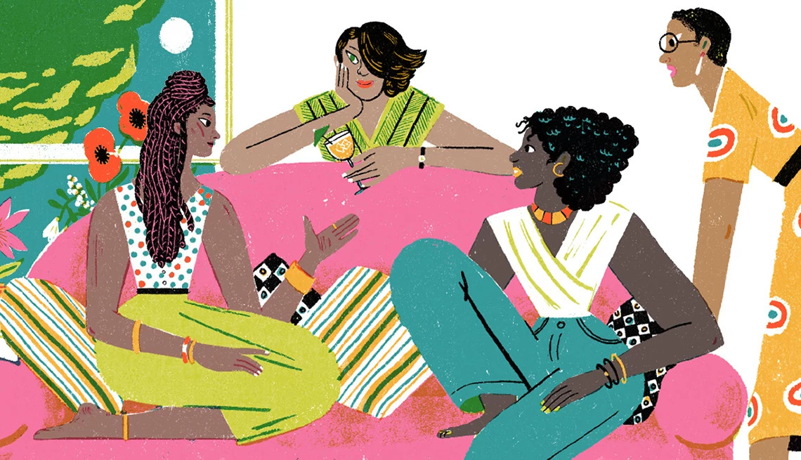 Four women standing close together