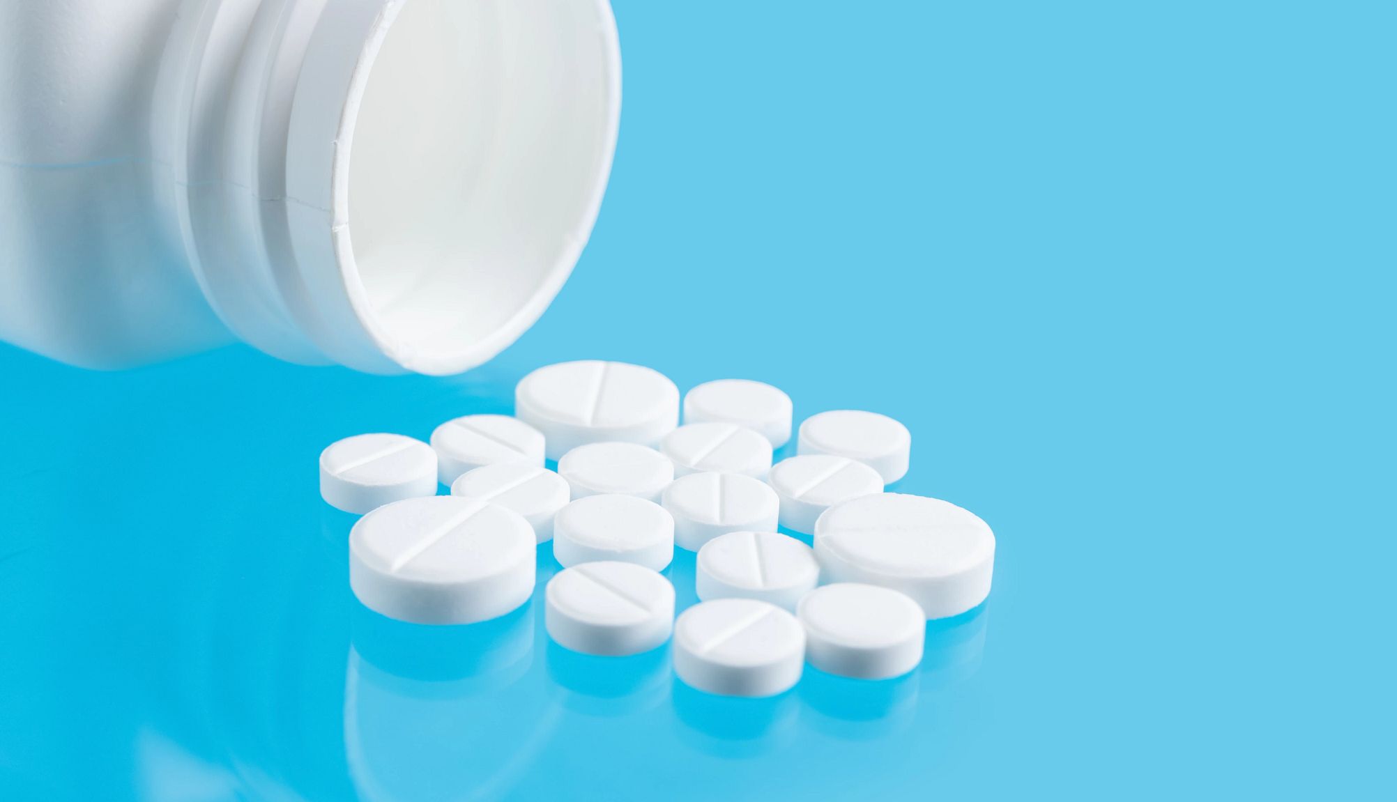 Statin Recall pills pouring out of bottle