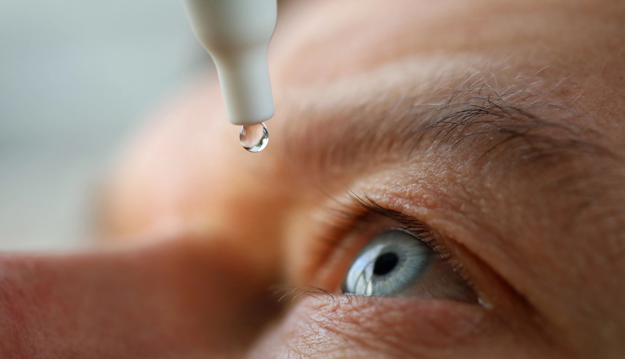 Eye Drop Recall person using eye drops
