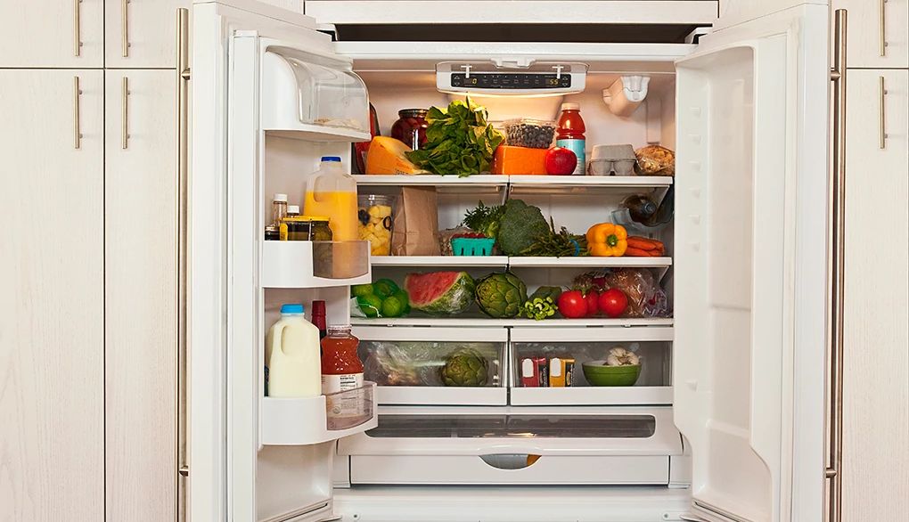 Take stock of the food you have at home and make some healthy changes An open refrigerator filled with healthy food