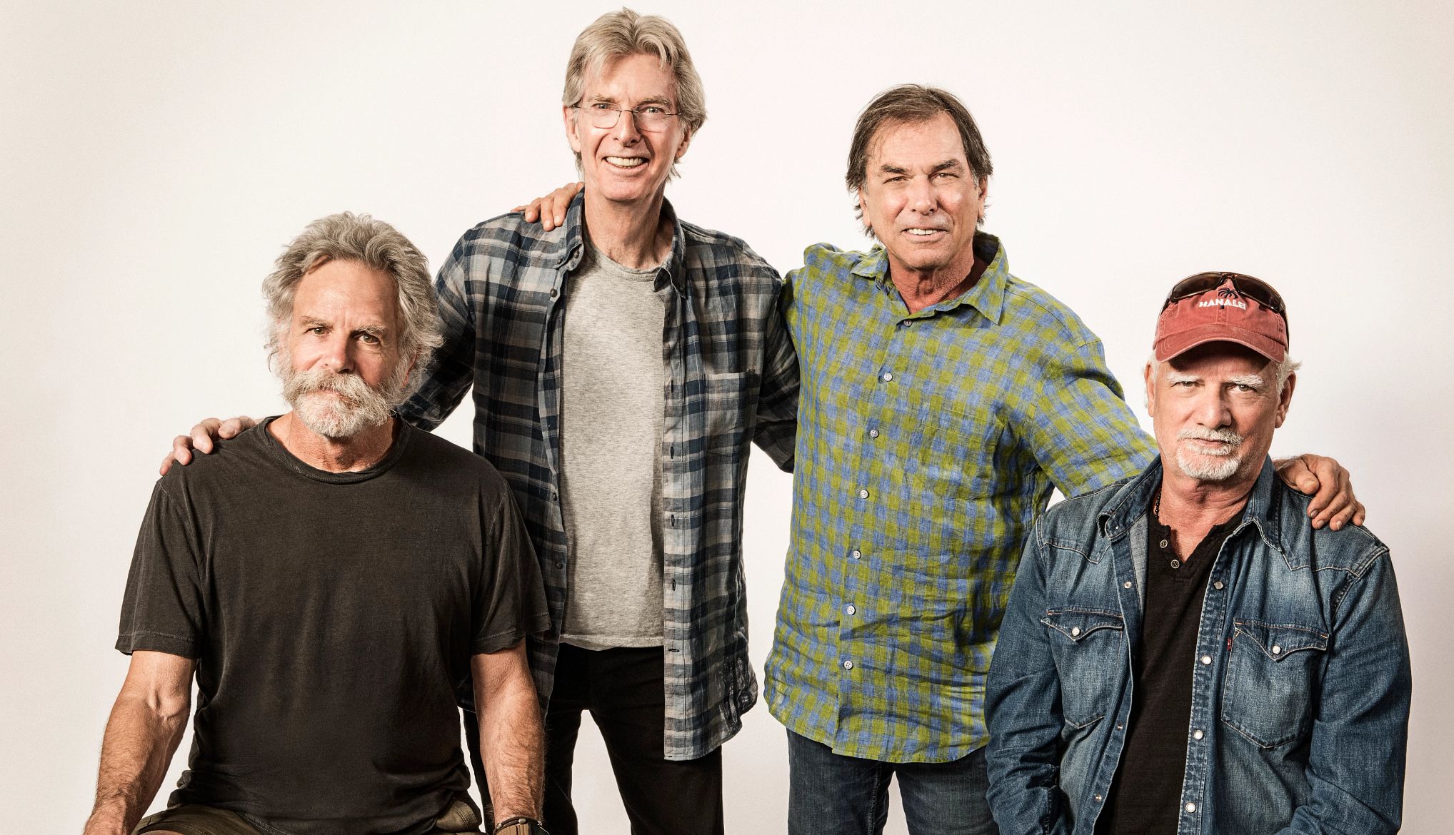 The Grateful Dead Members of the Grateful Dead together posing for a portrait