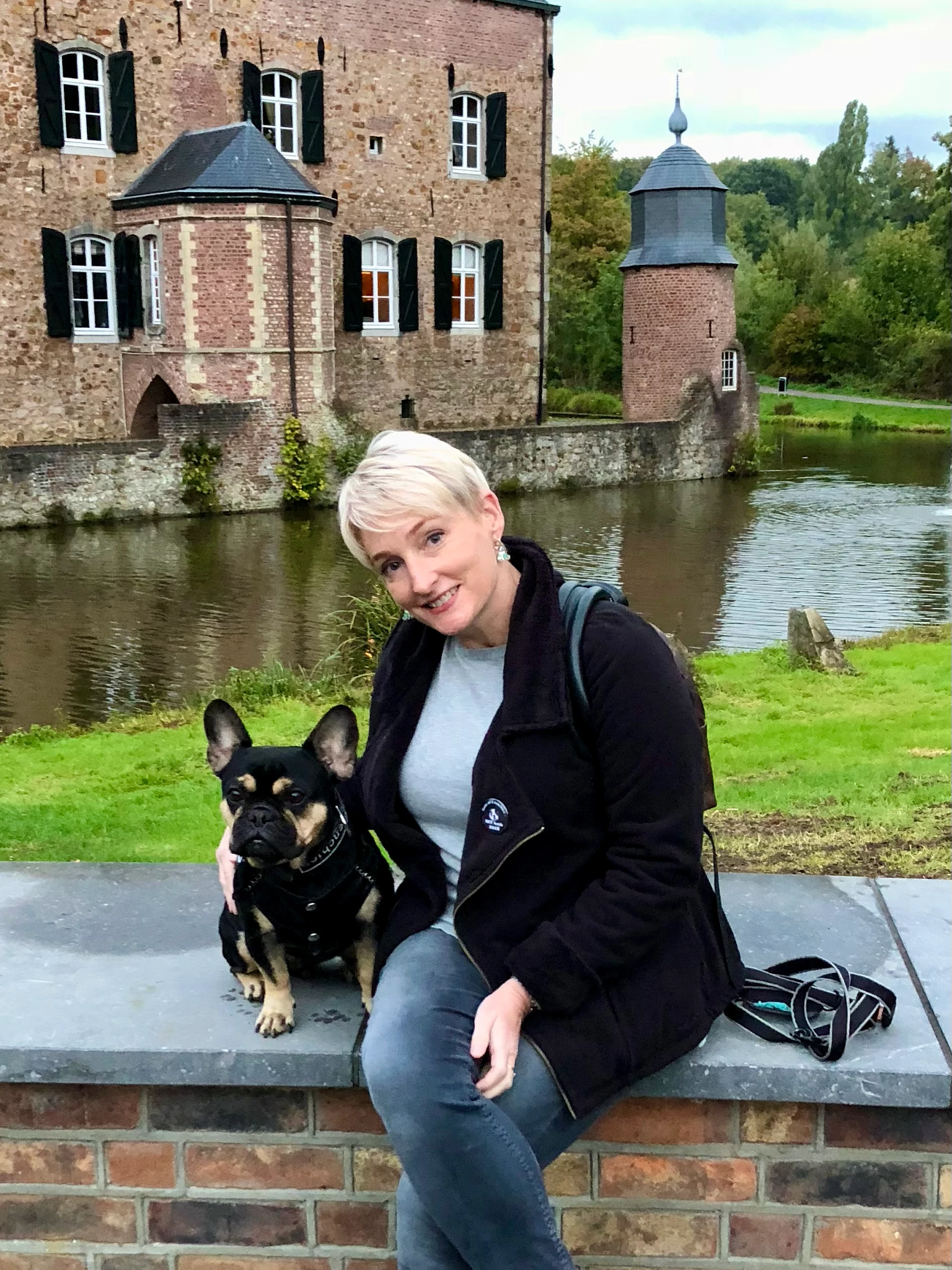 a woman with a dog on a cruise