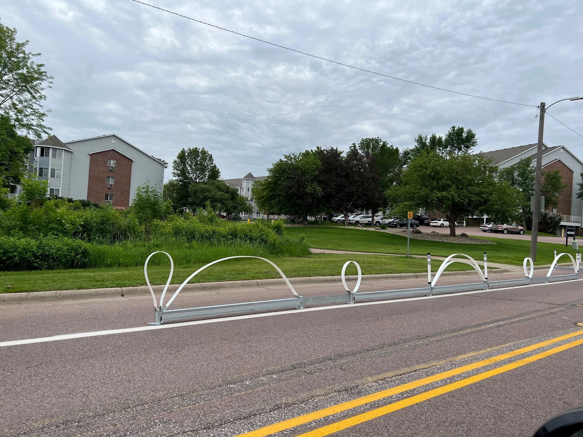 bike lane in neighborhood being separated by wire
