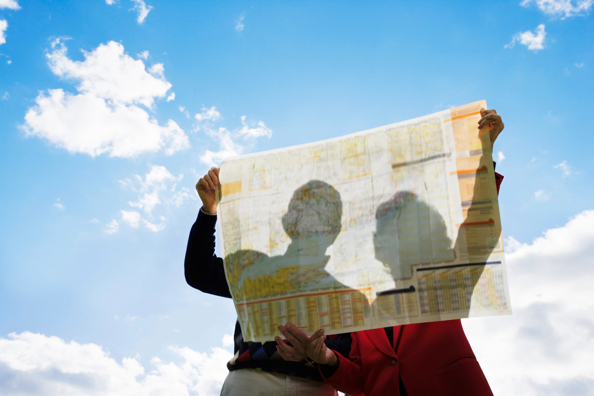 a couple looking at a map