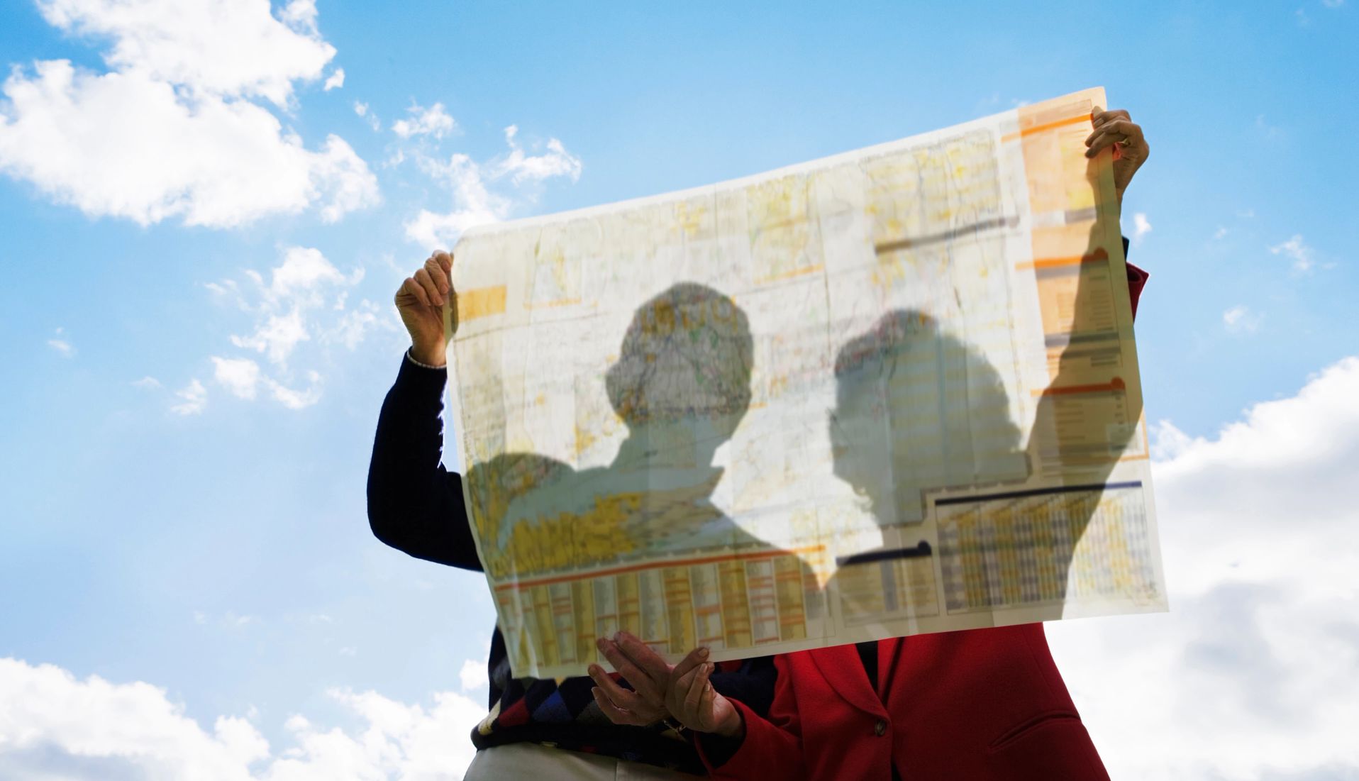 More 2025 Travel for Adults 50–Plus a couple looking at a map