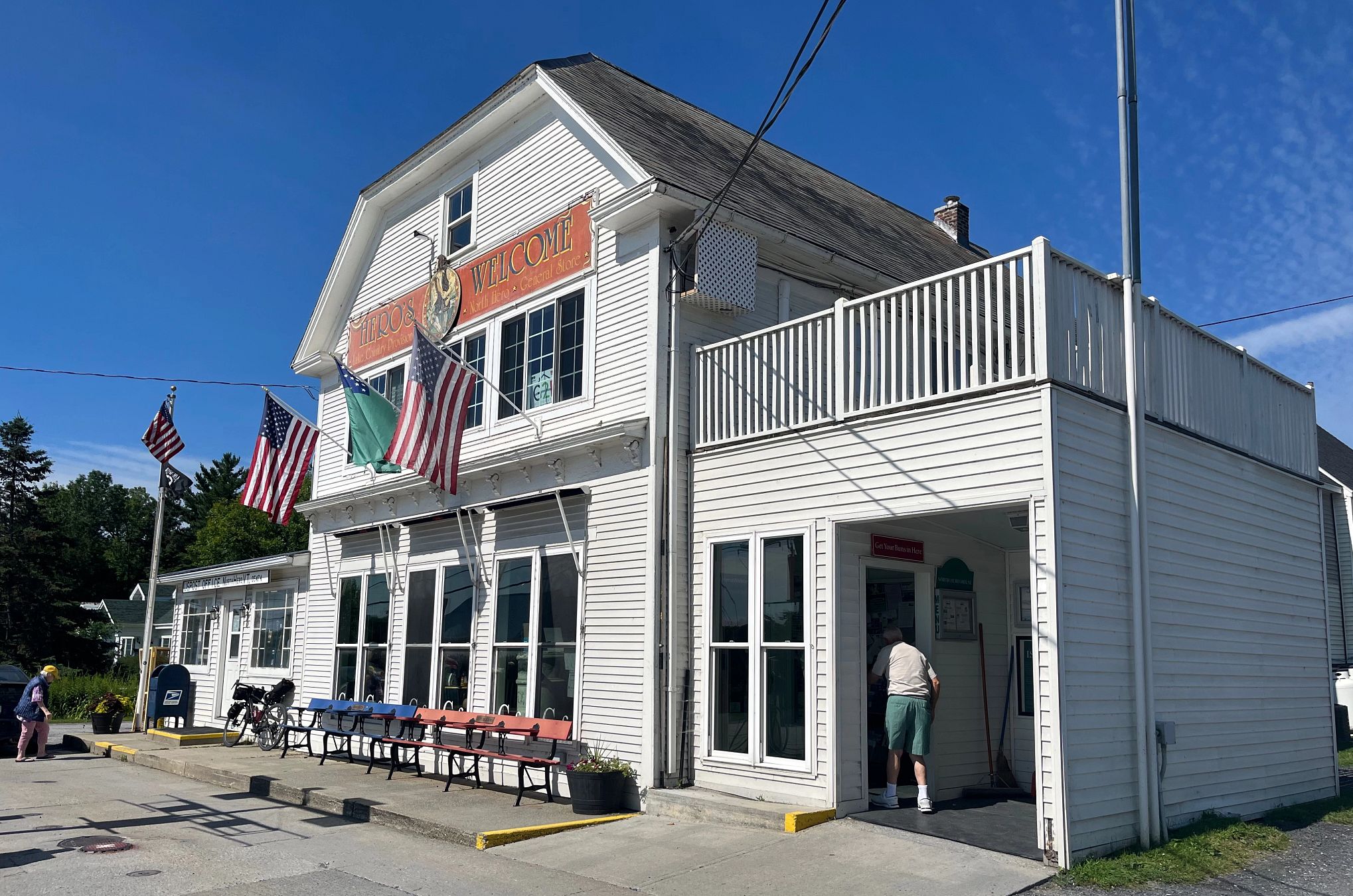 Great Lakes Getaways a pair of people walking into a store