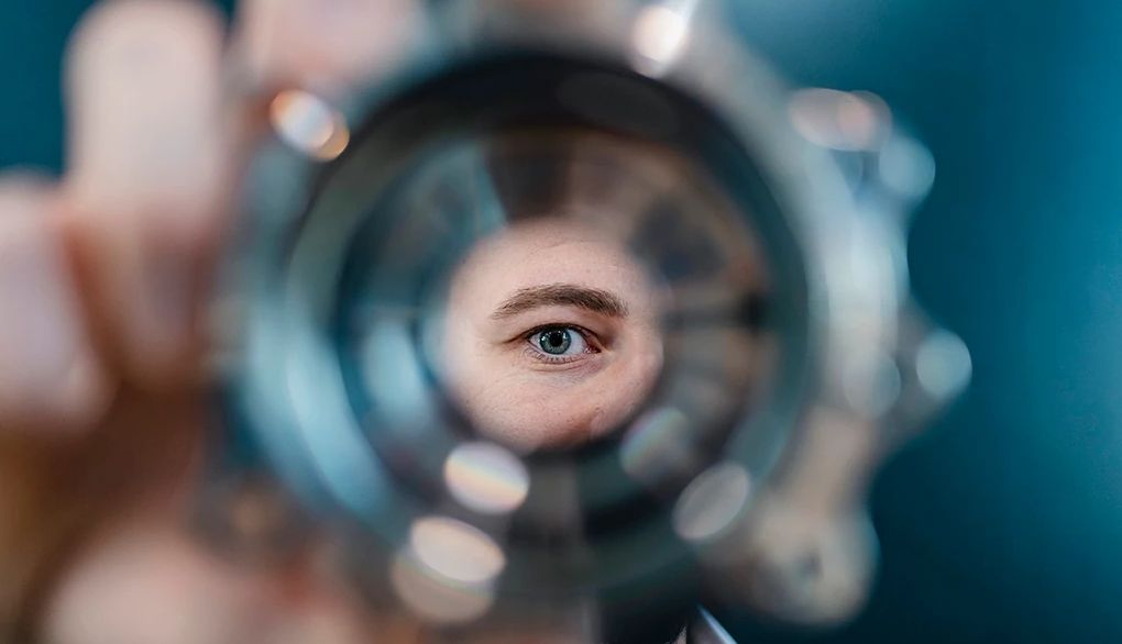 Learning to say no can free up space for what you want to focus on The eye of a man looking through a pipe