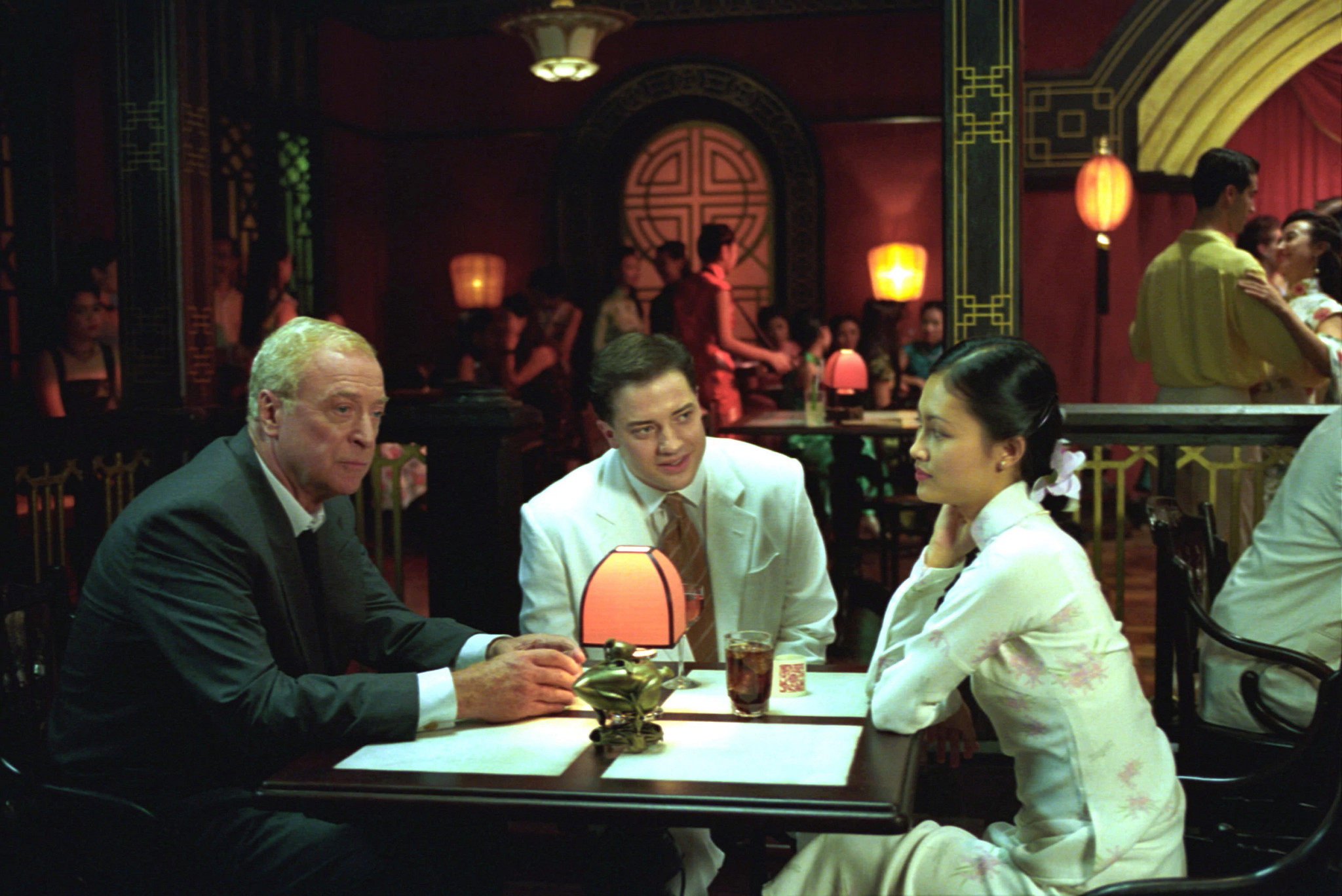 Michael Caine, Brendan Fraser and Do Thi Hai Yen in a scene from The Quiet American