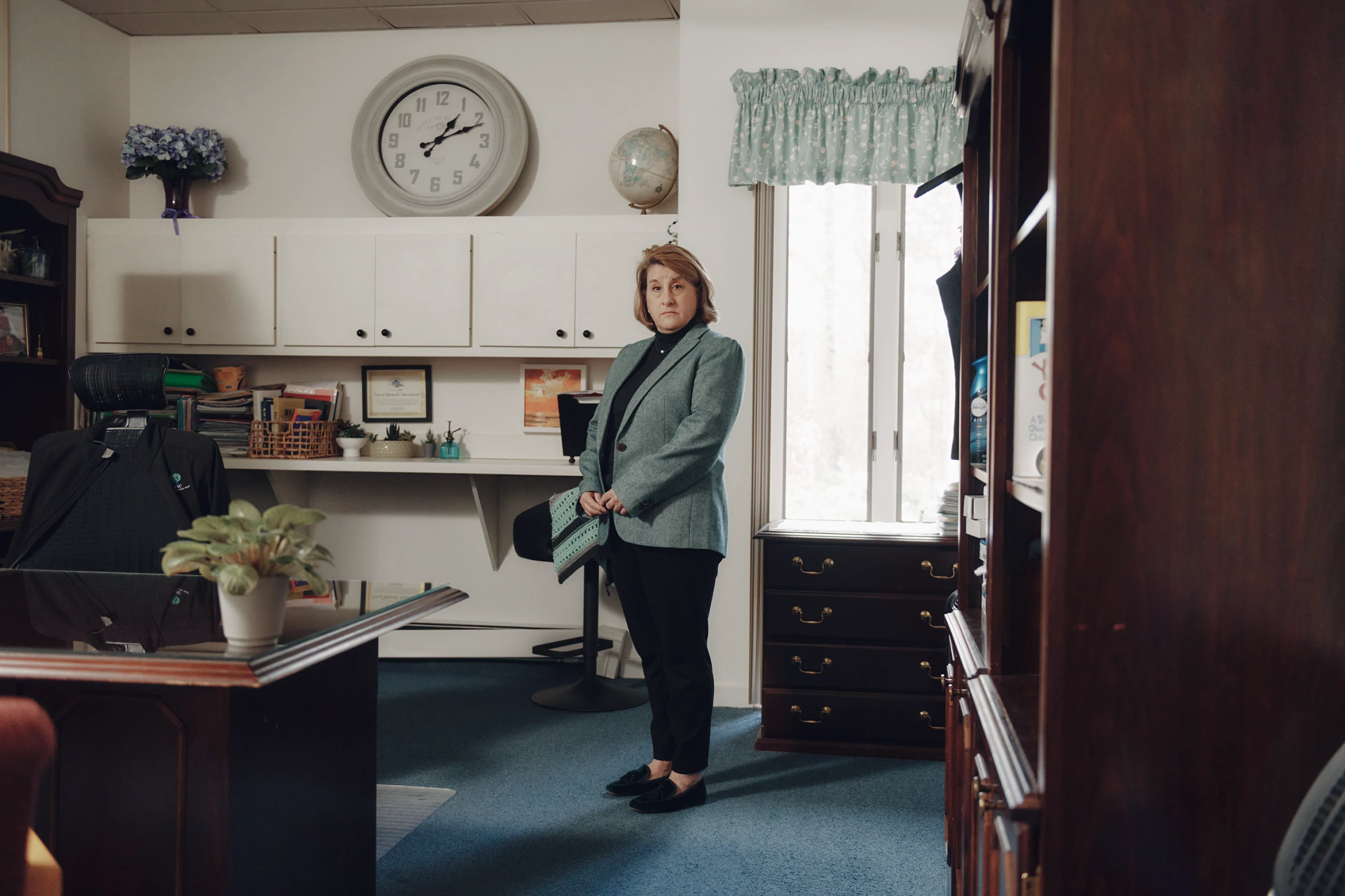 a person standing in an office