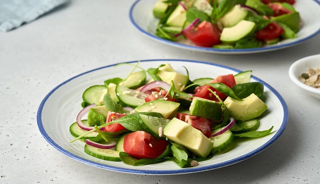 Plant-based diets are associated with better brain health A close-up view of two plates of a vegetable salad