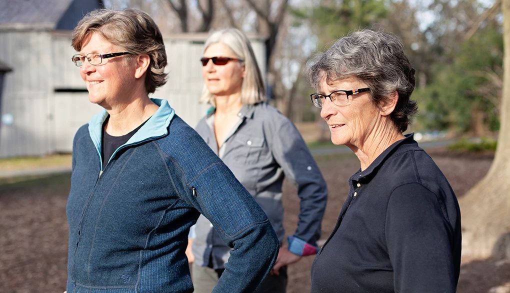Three women who cross the country to find adventure Three women looking out at something