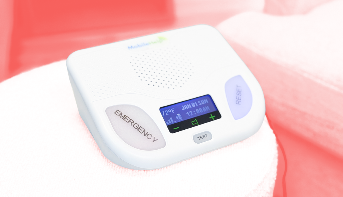 The MobileHelp Classic Cellular medical alert system on a red background