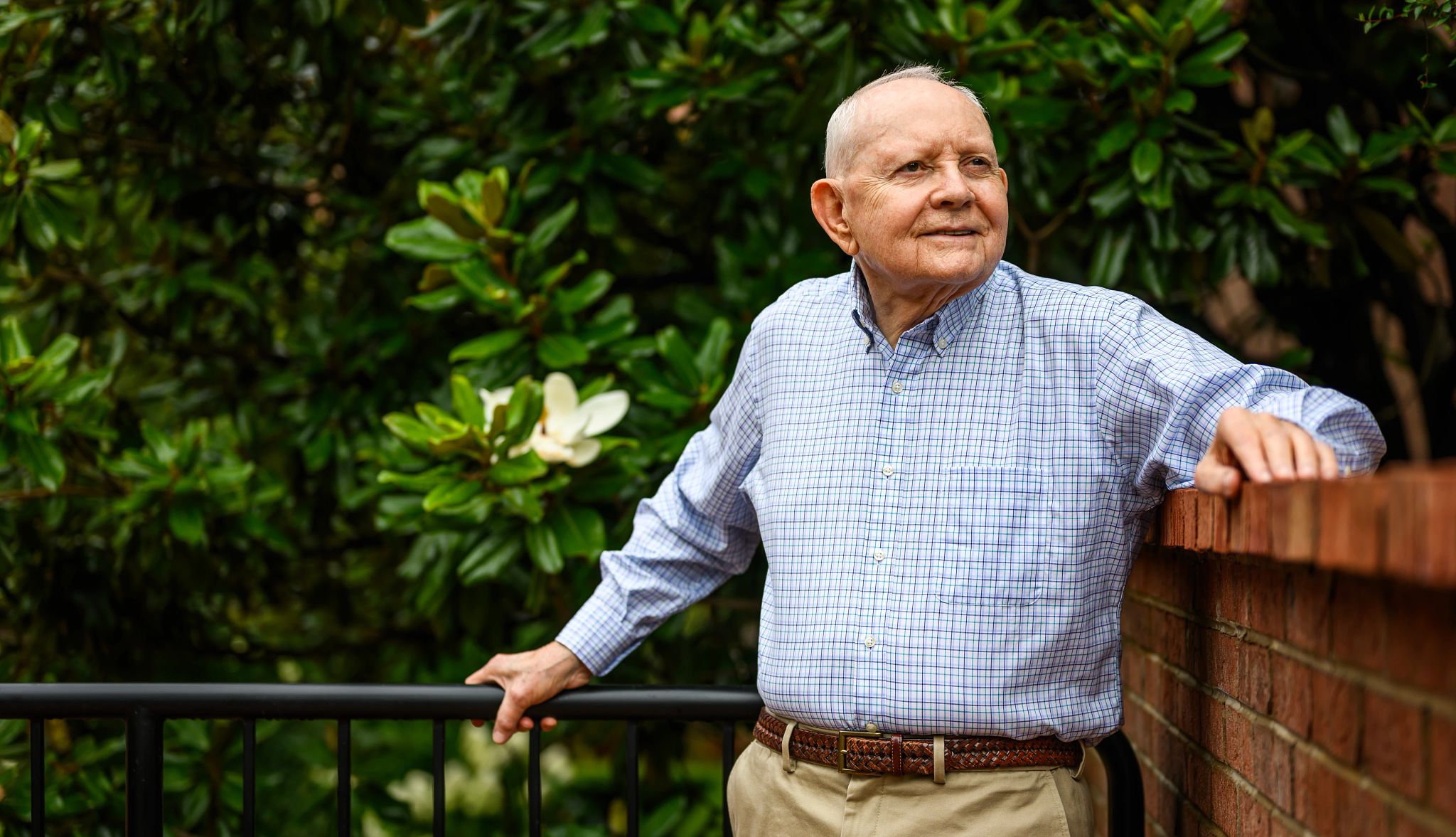 Gordon Irwin Gordon Irwin leans against a brick wall outside his home