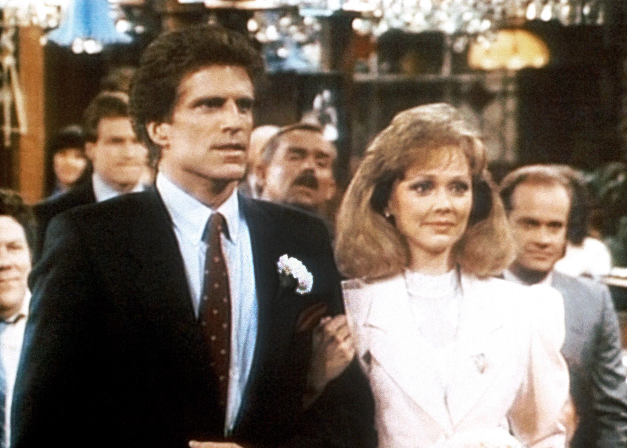 ted danson and shelley long in a scene from an episode of cheers