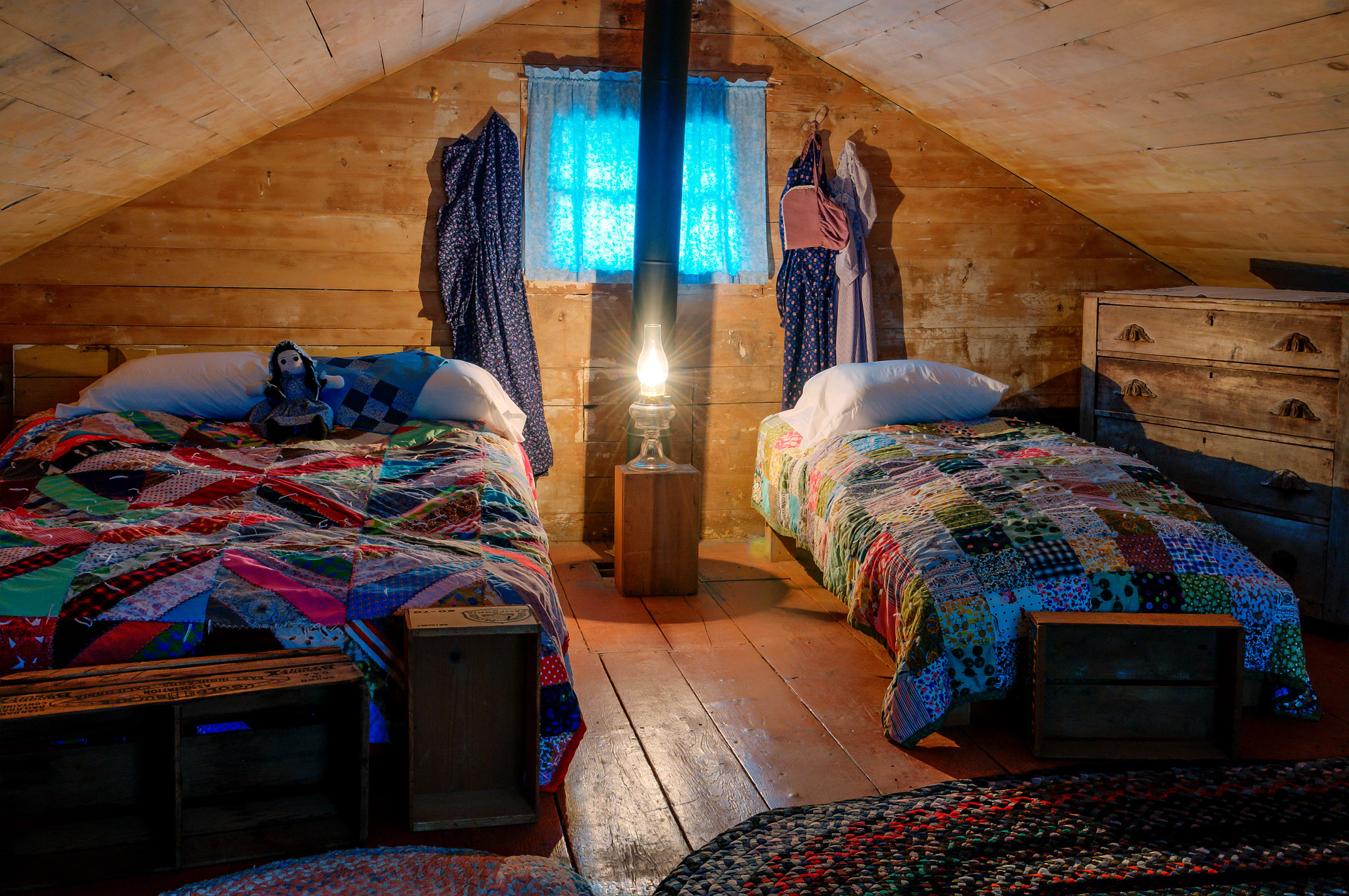 two beds in a small bedroom