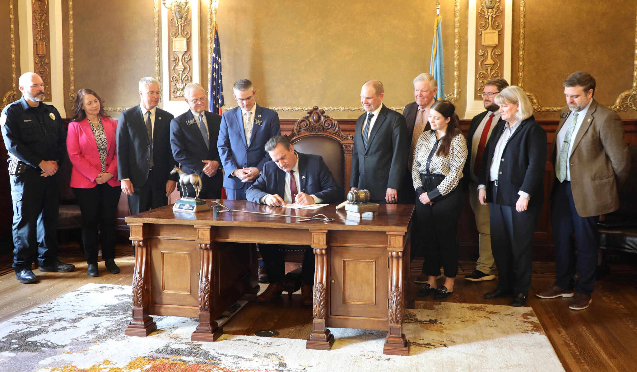 people at a bill signing