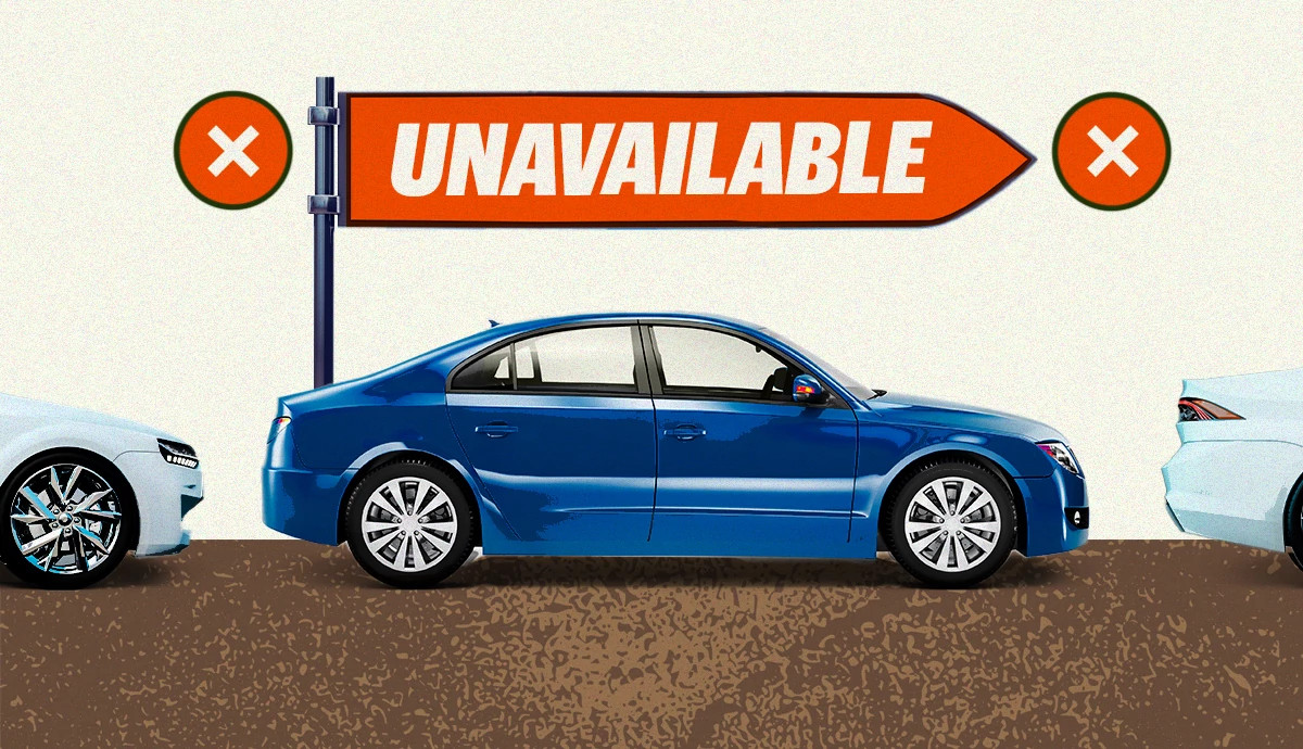 an unavailable sign above a car in a row of other vehicles