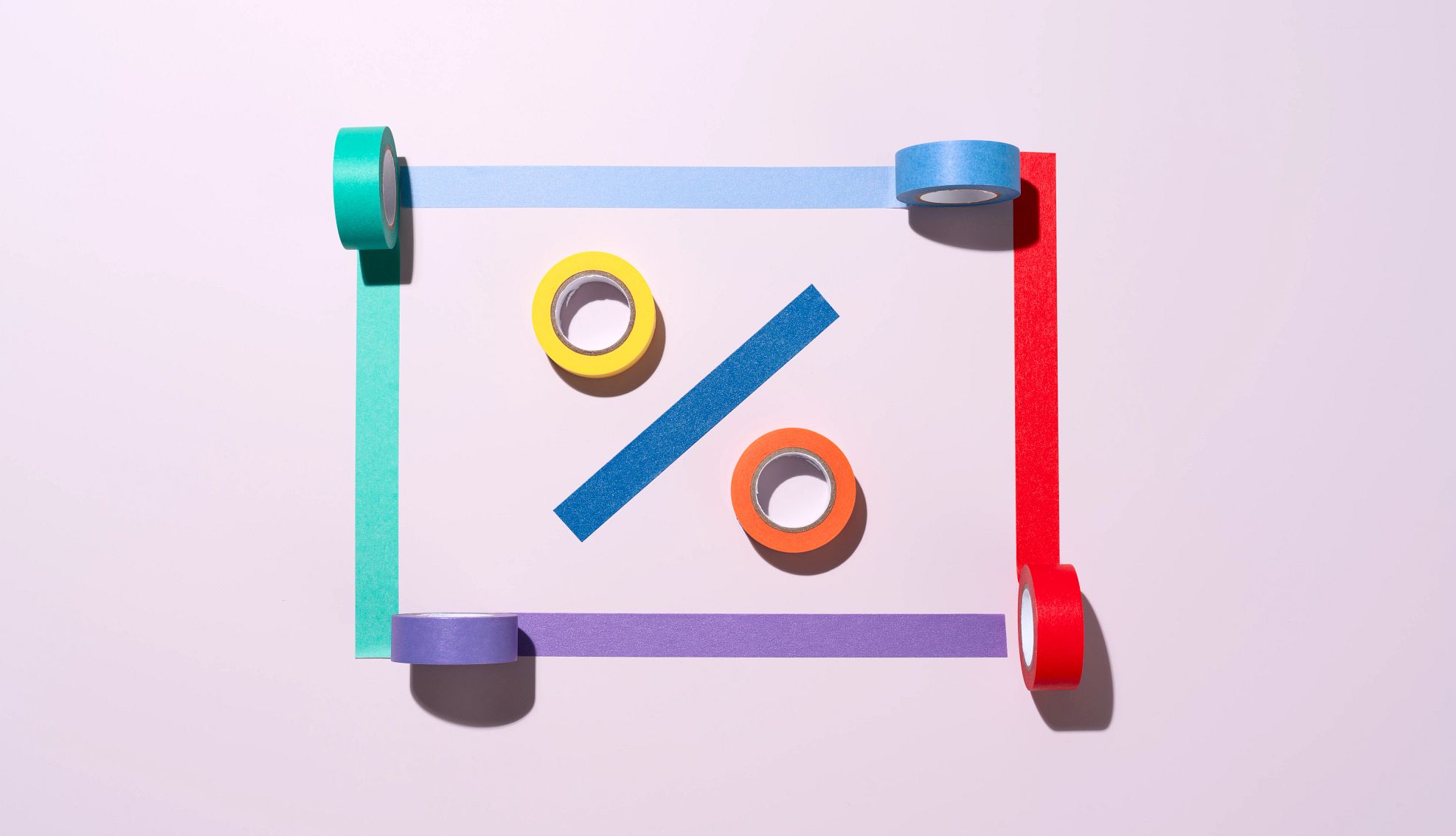 2026 IRS Tax Brackets a percent sign with a box around it. all elements are made of colored masking tape