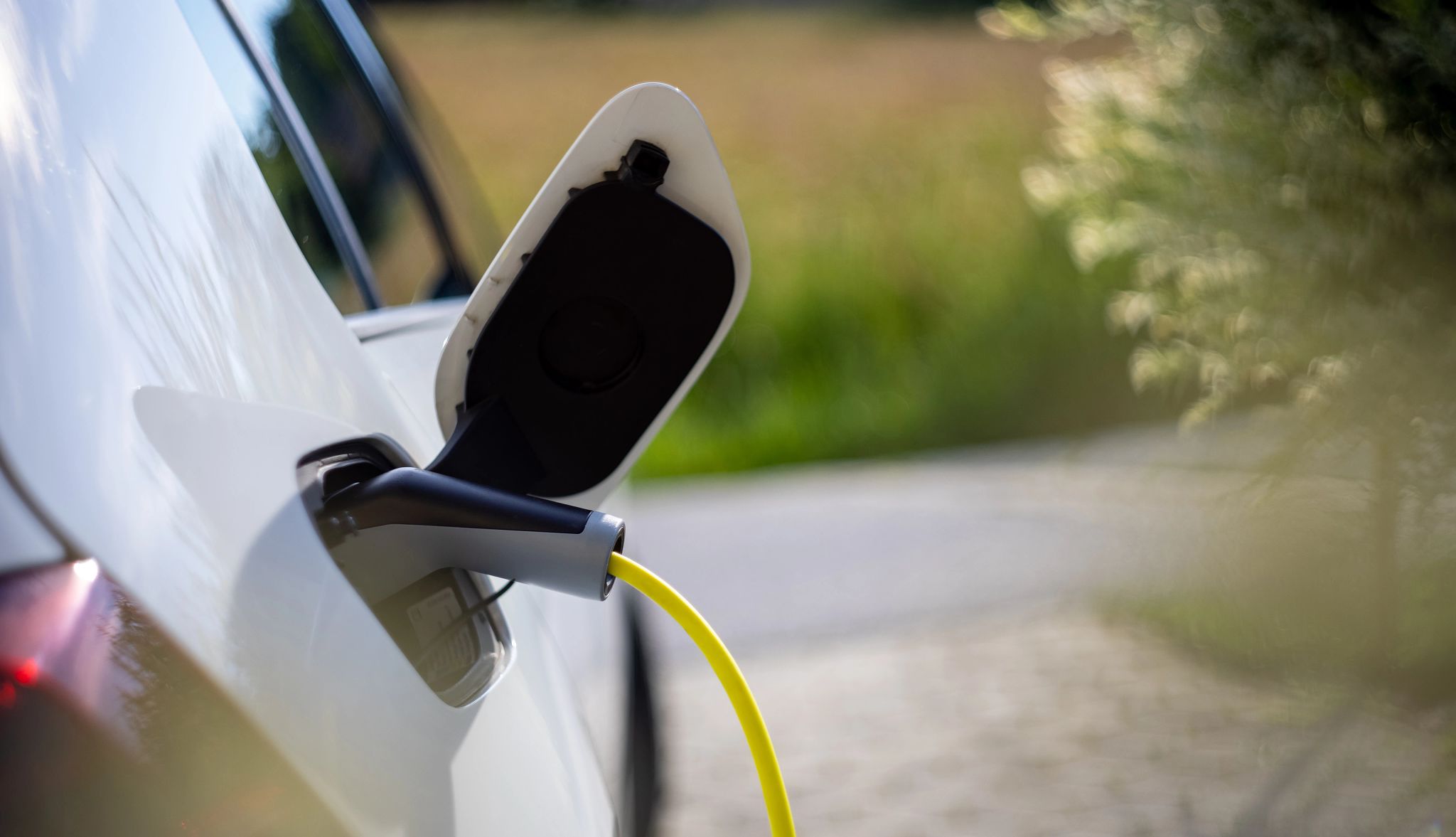 Why go electric? Charger charging vehicle