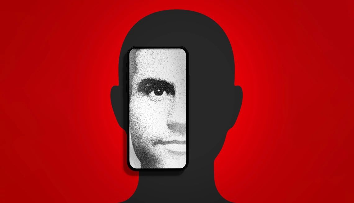 Criminals use AI technology to impersonate people on the phone a silhouette of a person with a phone over part of the face with a picture of a face