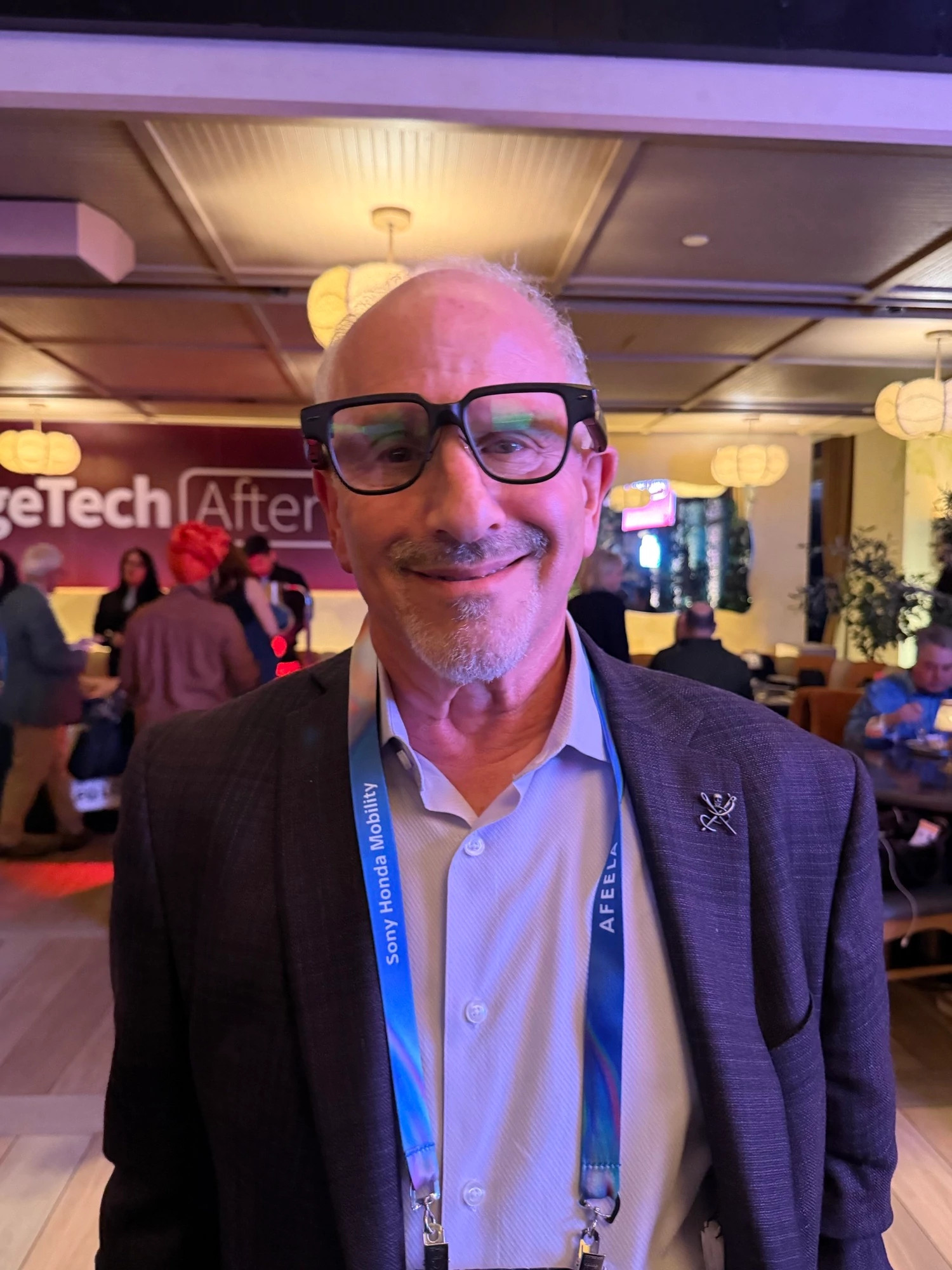 a photo shows Edward C. Baig wearing Captify glasses