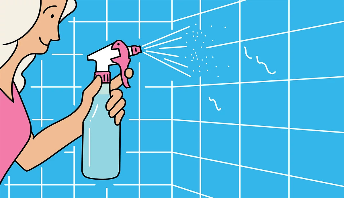 an illustration shows a woman shining bathroom tiles with a spray bottle full of vinegar