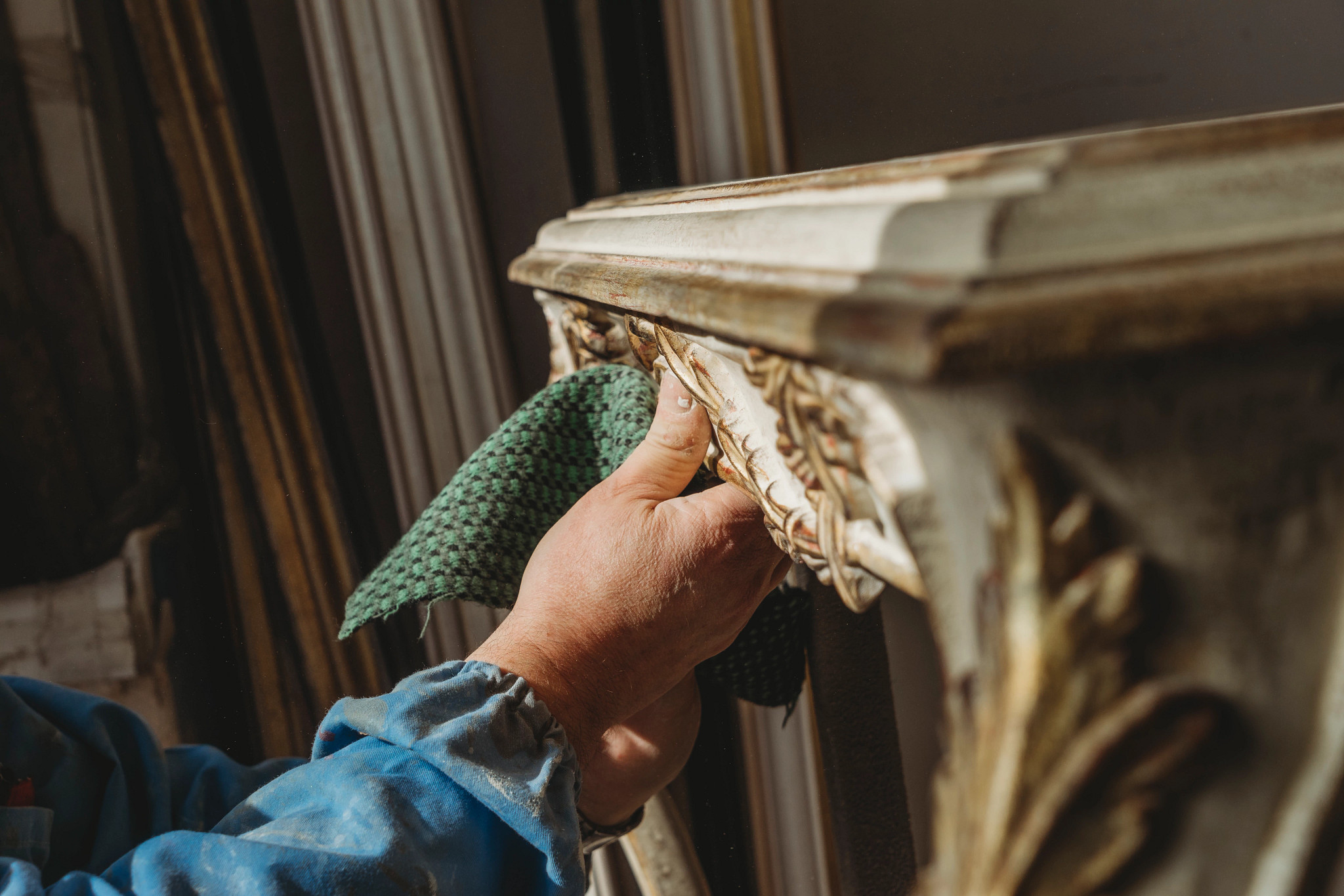 a photo shows an antique being cleaned