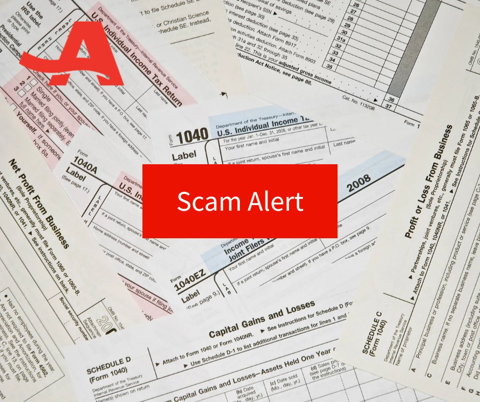 Tax documents with the words scam alert on top of them