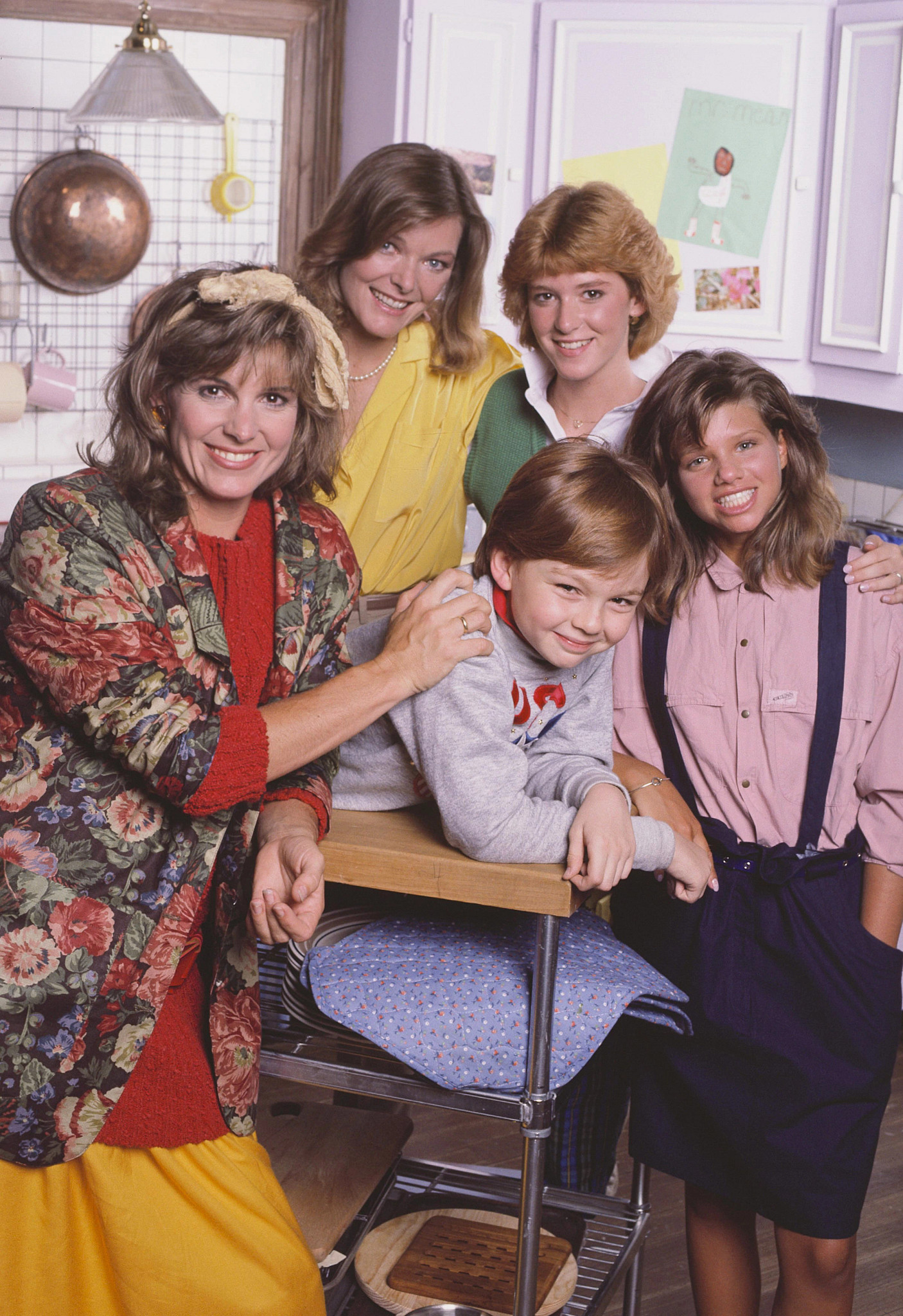 Susan Saint Kames with Jane Curtain, Allison Smith, Ari Meyers and Frederick Koehler standing together in a kitchen