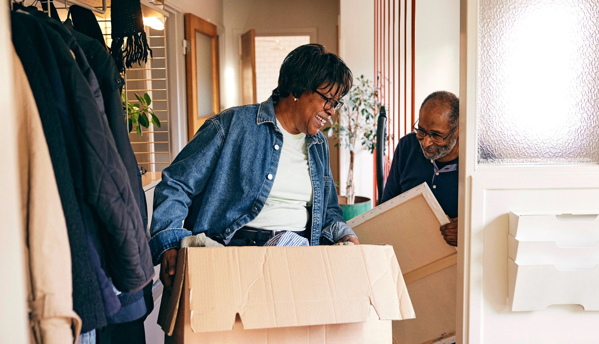 Is a 55+ Community for You? A photo shows an older adult couple moving into a 55-plus community.