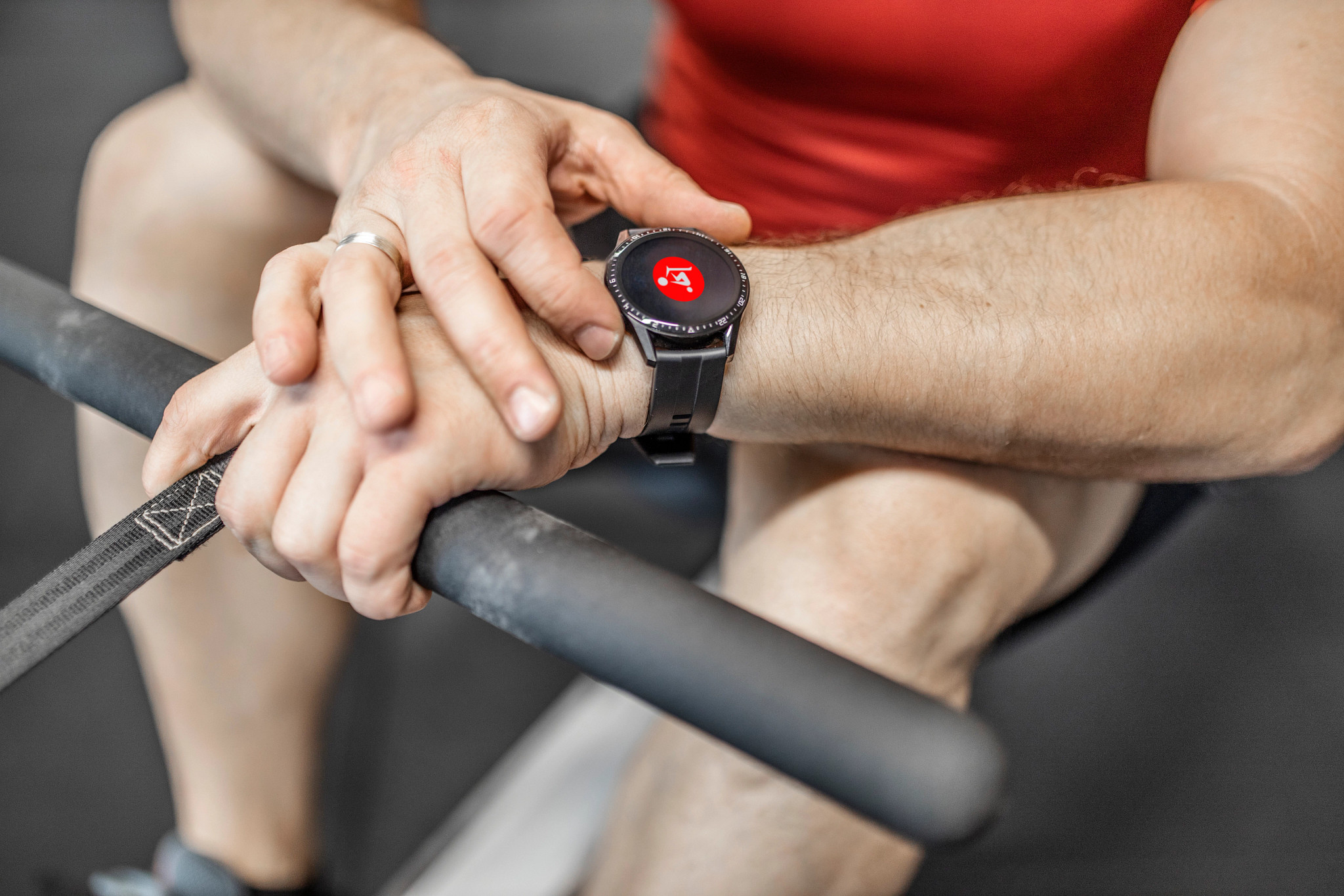 a person doing a workout while adjusting their smart watch
