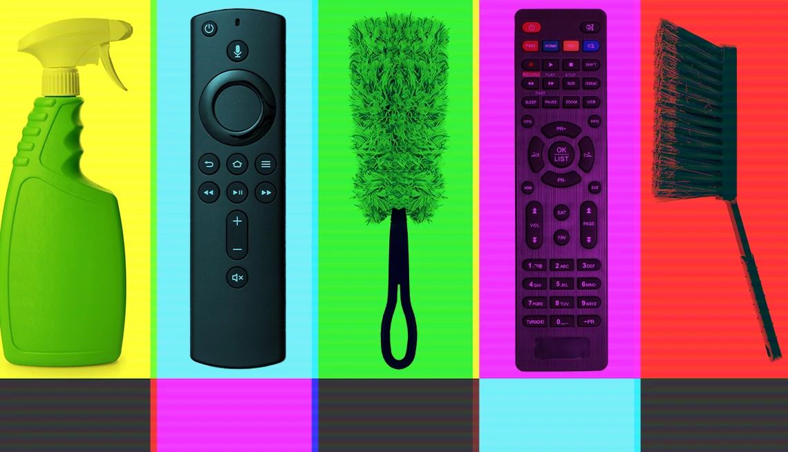 A spray bottle, television remote, a brush, another television remote and another brush side by side with television color bars in the background