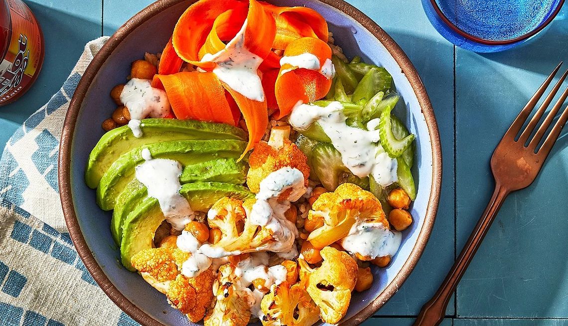 https://aarp.widen.net/content/jemicvgjx3/jpeg/1140-buffalo-cauliflower-grain-bowl.jpg?crop=true&anchor=0,0&q=80&color=ffffffff&u=xp0vsk&w=1140&h=655 https://aarp.widen.net/content/jemicvgjx3/jpeg/1140-buffalo-cauliflower-grain-bowl.jpg?crop=true&anchor=0,0&q=80&color=ffffffff&u=xp0vsk&w=1140&h=655